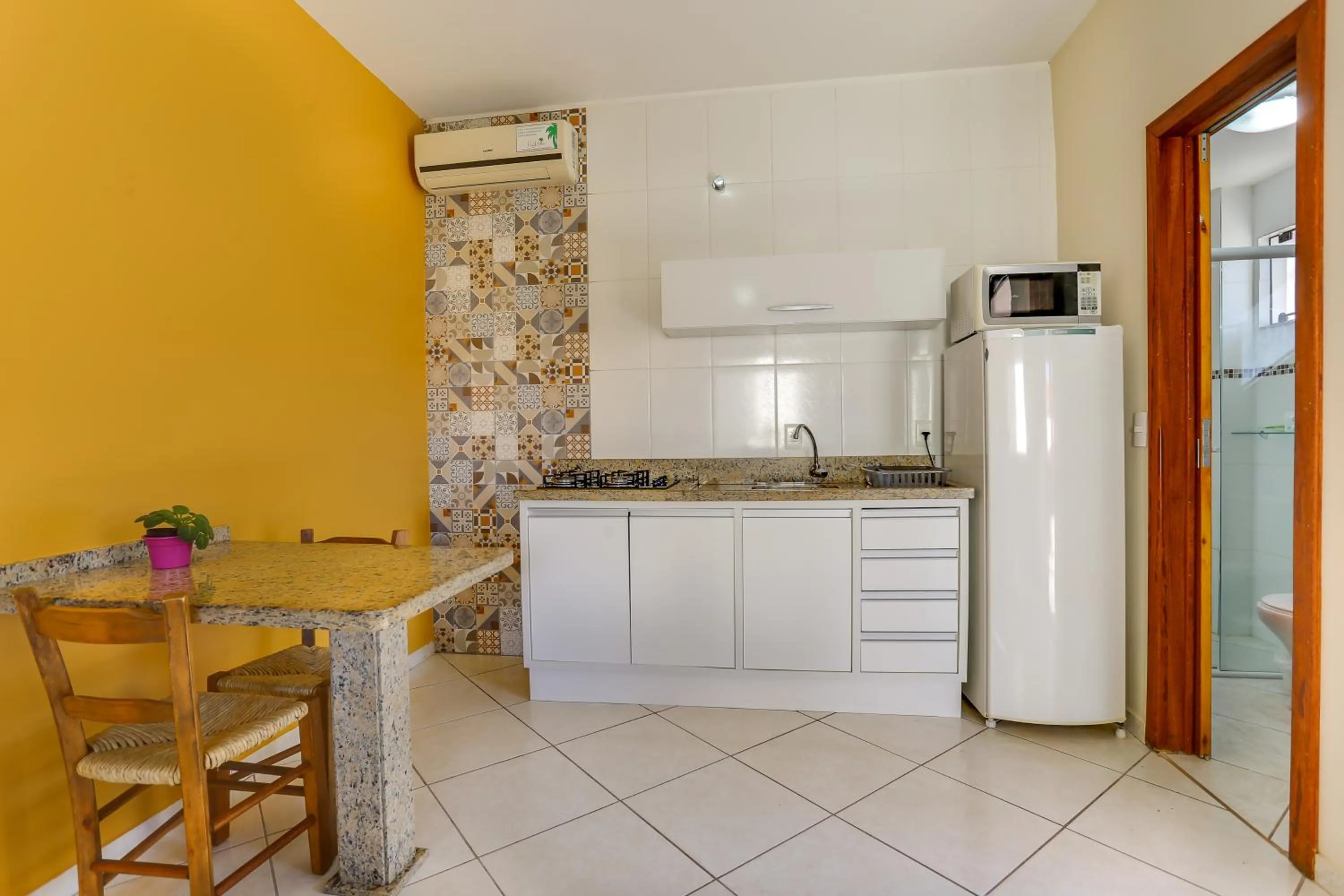 Kitchen or kitchenette in Pousada Praia dos Ingleses