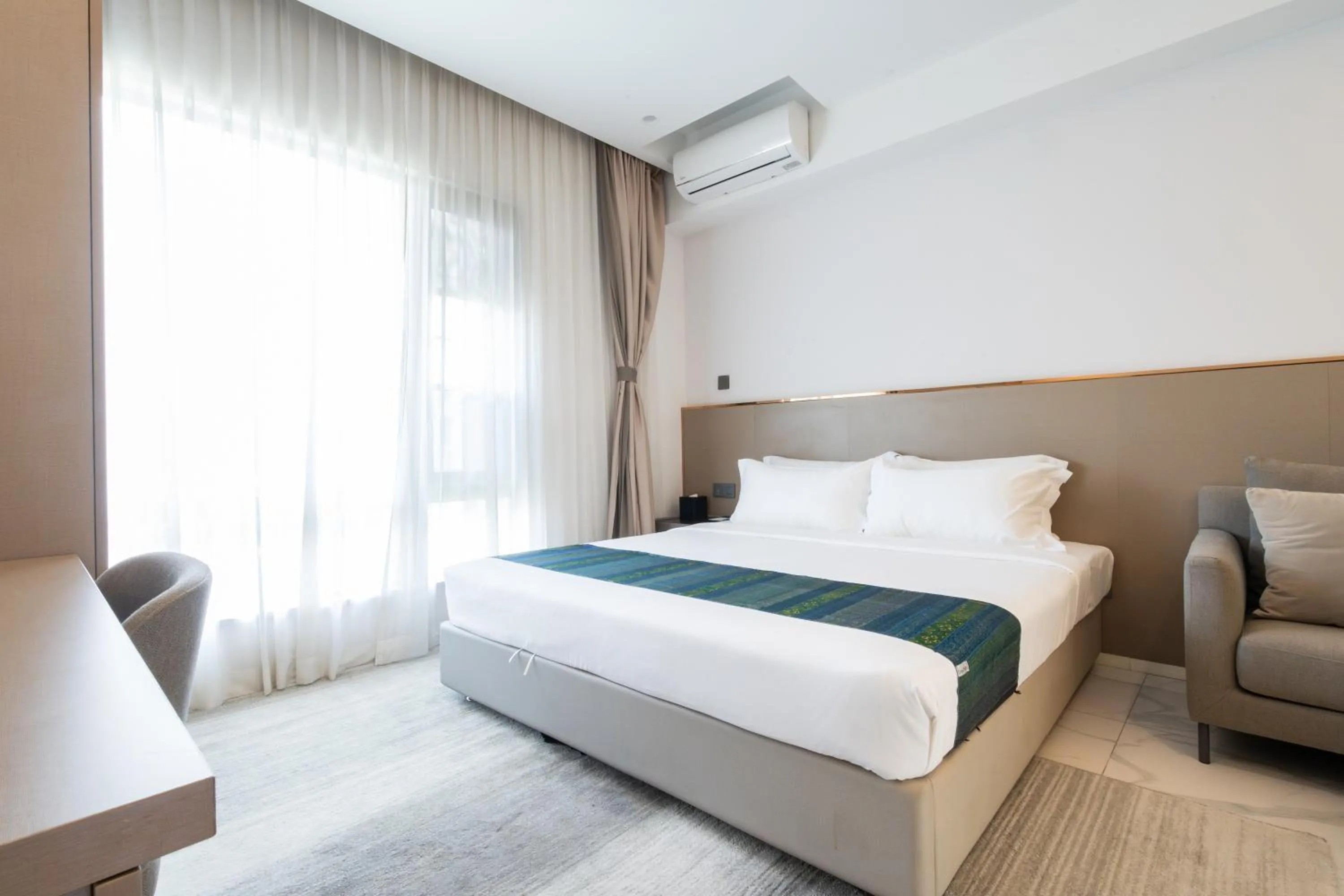 Bed in One Park Hotel & Residence