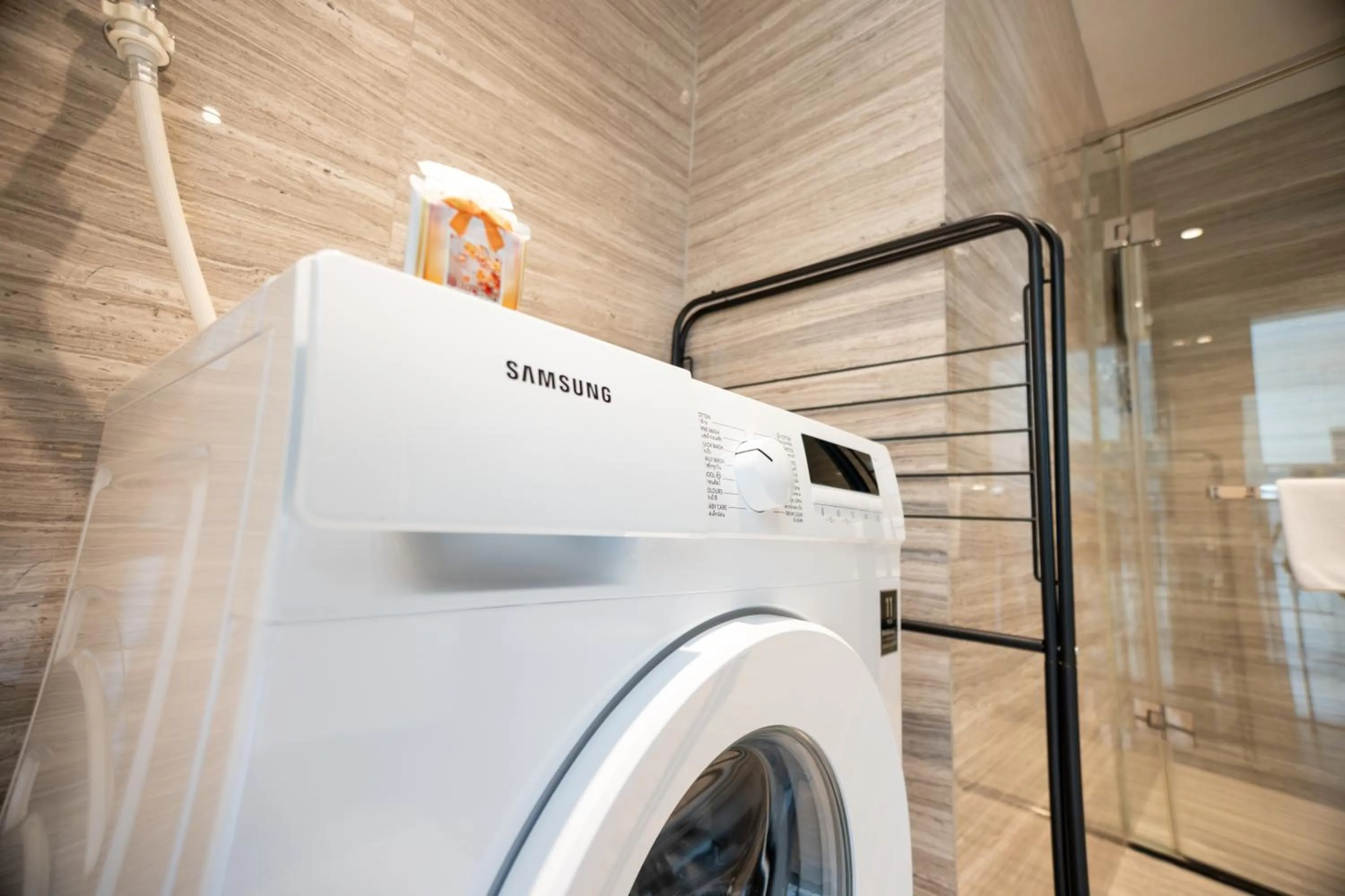 washing machine in One Park Hotel & Residence