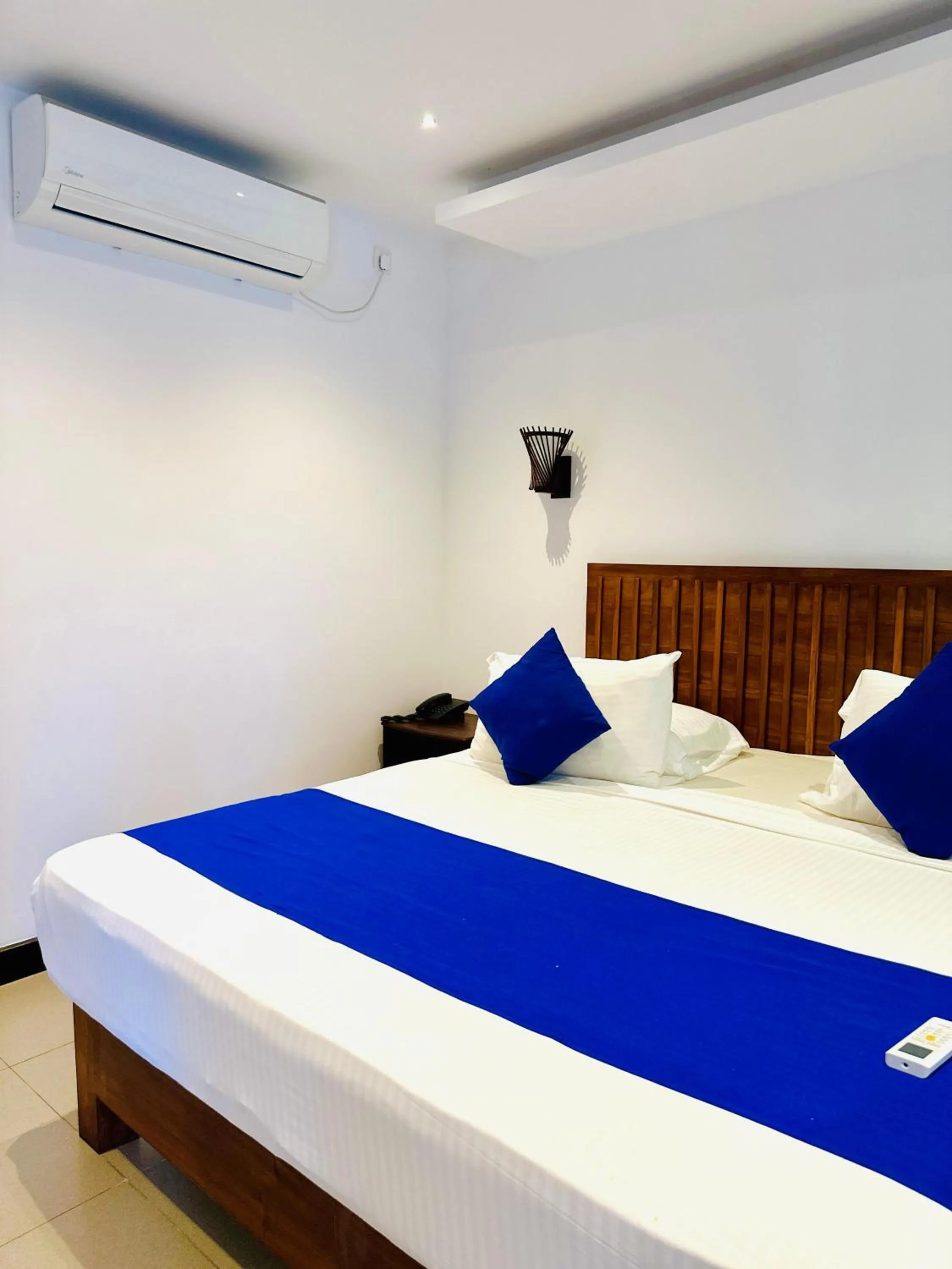 Bed in J7 Villaj Resort