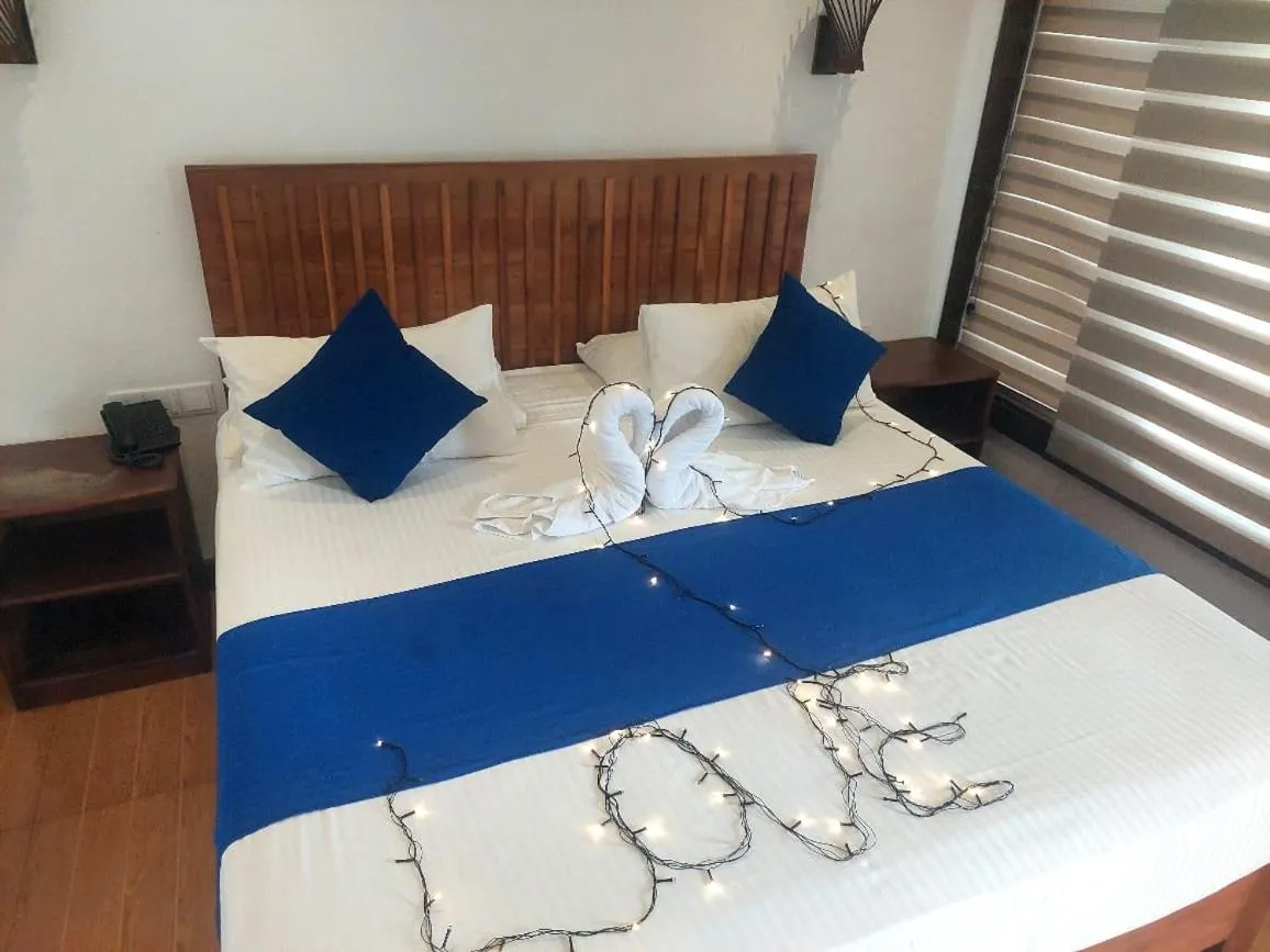 Bed in J7 Villaj Resort