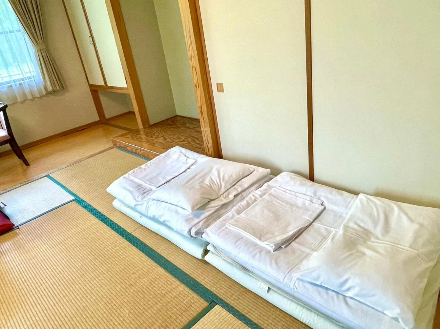 Bed in Lake Side Nikko Hotel