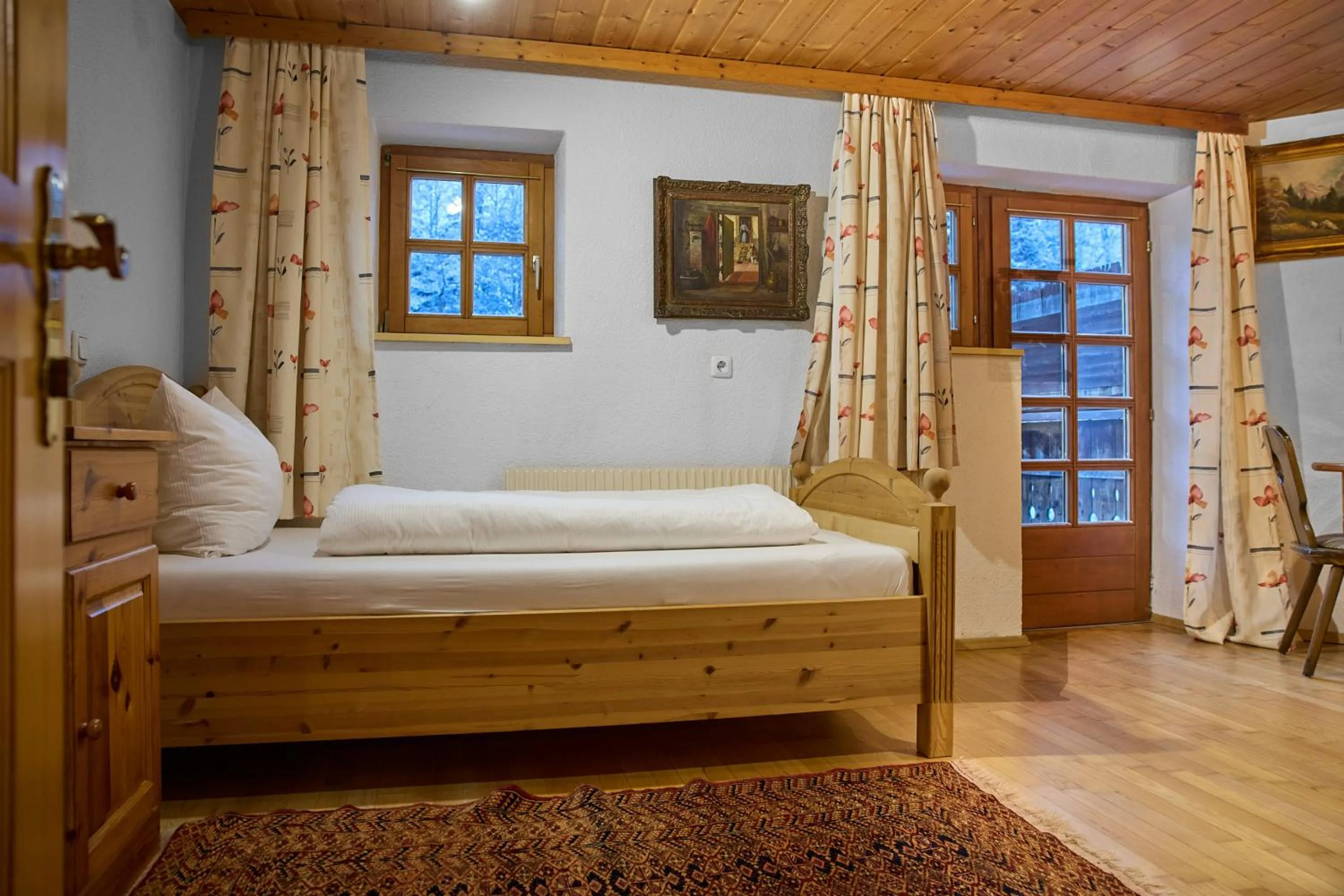 Bed in Alt Montafon Hotel Appartements by Pferd auf Wolke