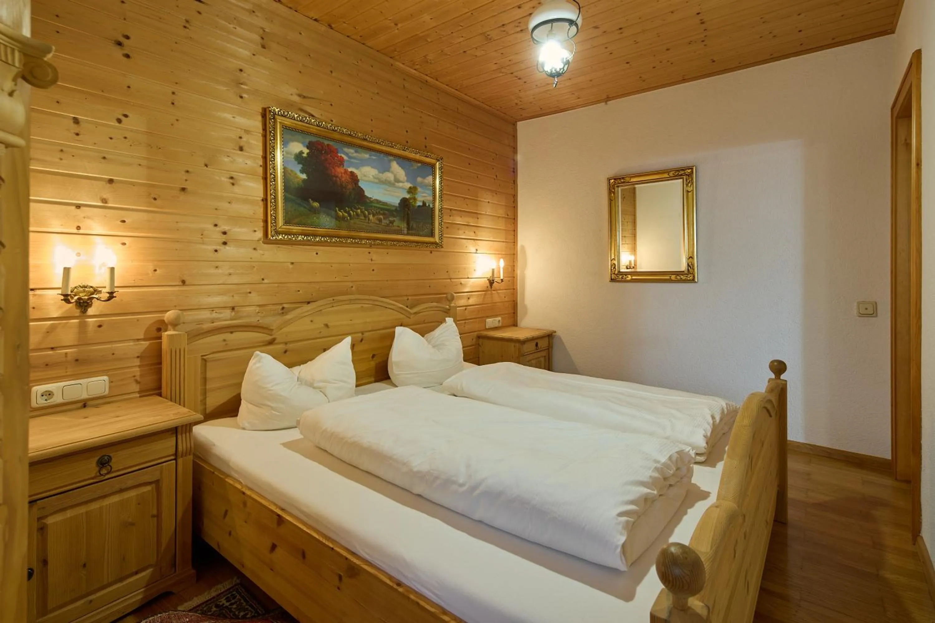 Bed in Alt Montafon Hotel Appartements by Pferd auf Wolke