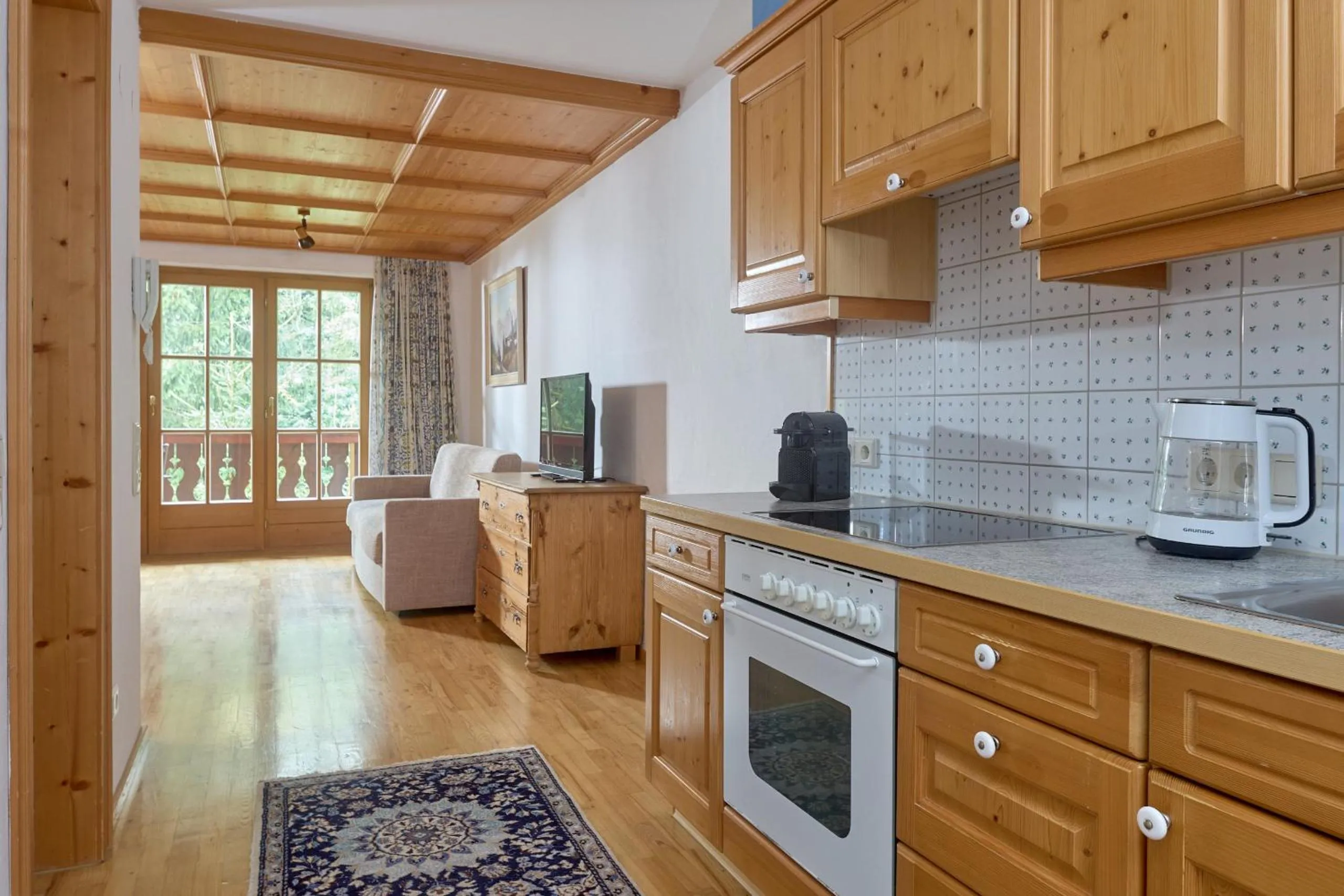 Kitchen or kitchenette in Alt Montafon Hotel Appartements by Pferd auf Wolke