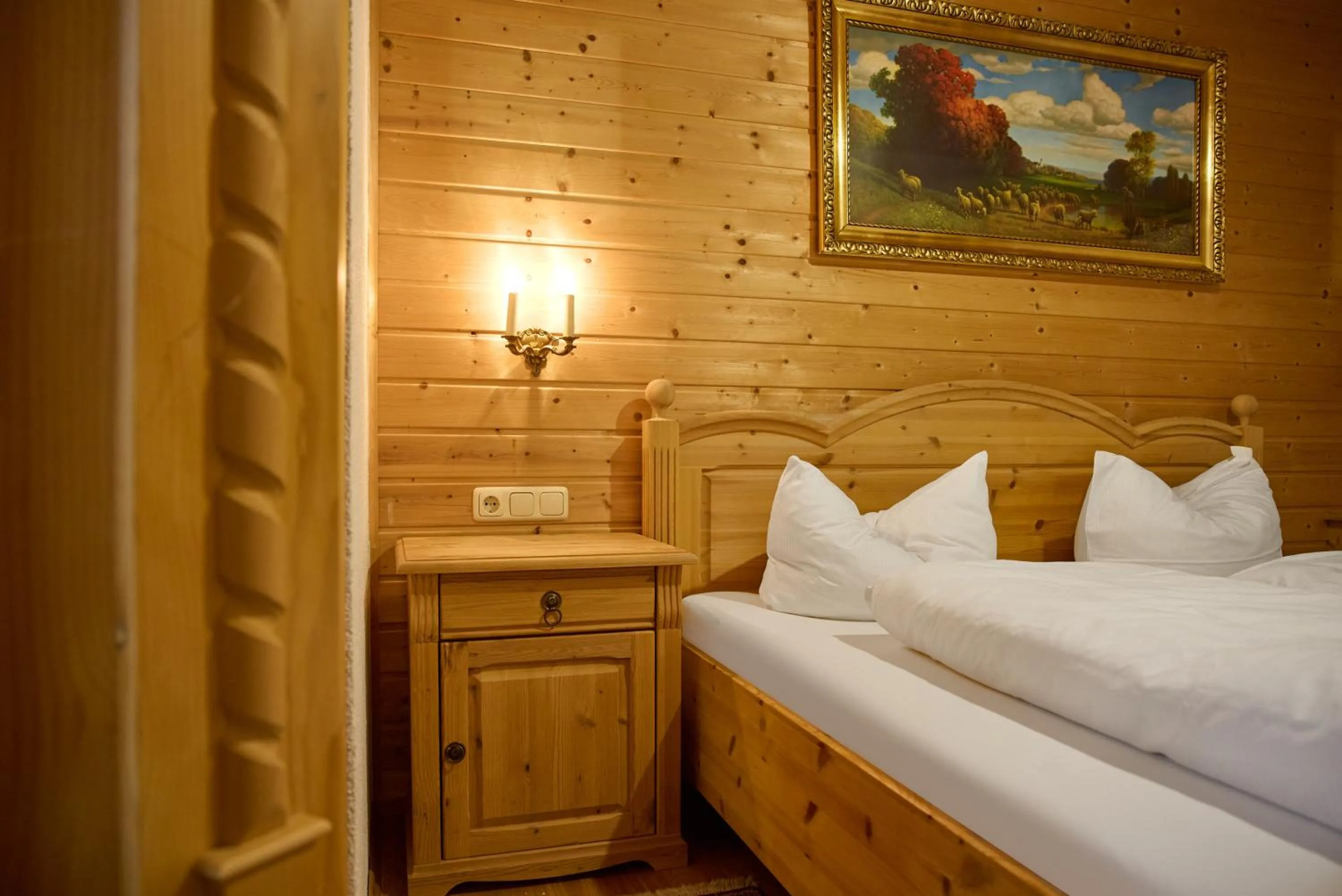 Bed in Alt Montafon Hotel Appartements by Pferd auf Wolke