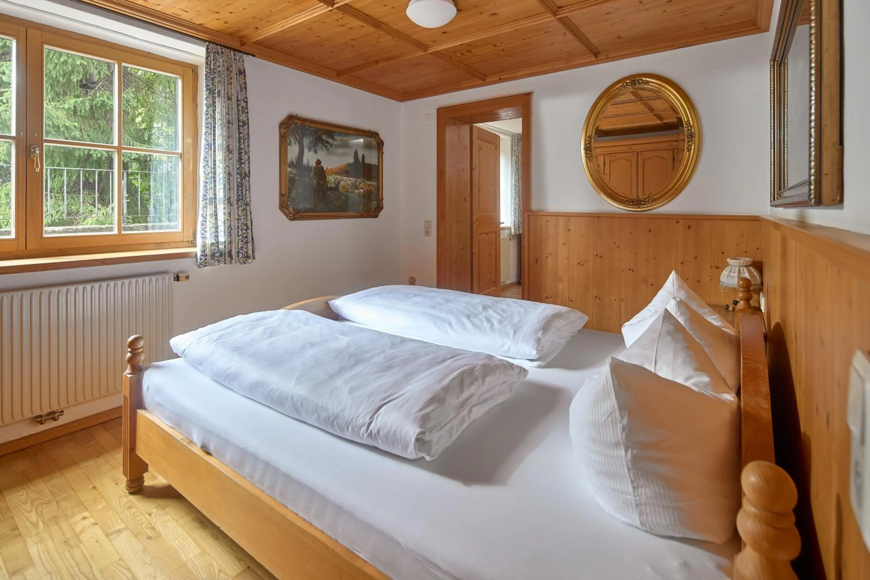 Bed in Alt Montafon Hotel Appartements by Pferd auf Wolke