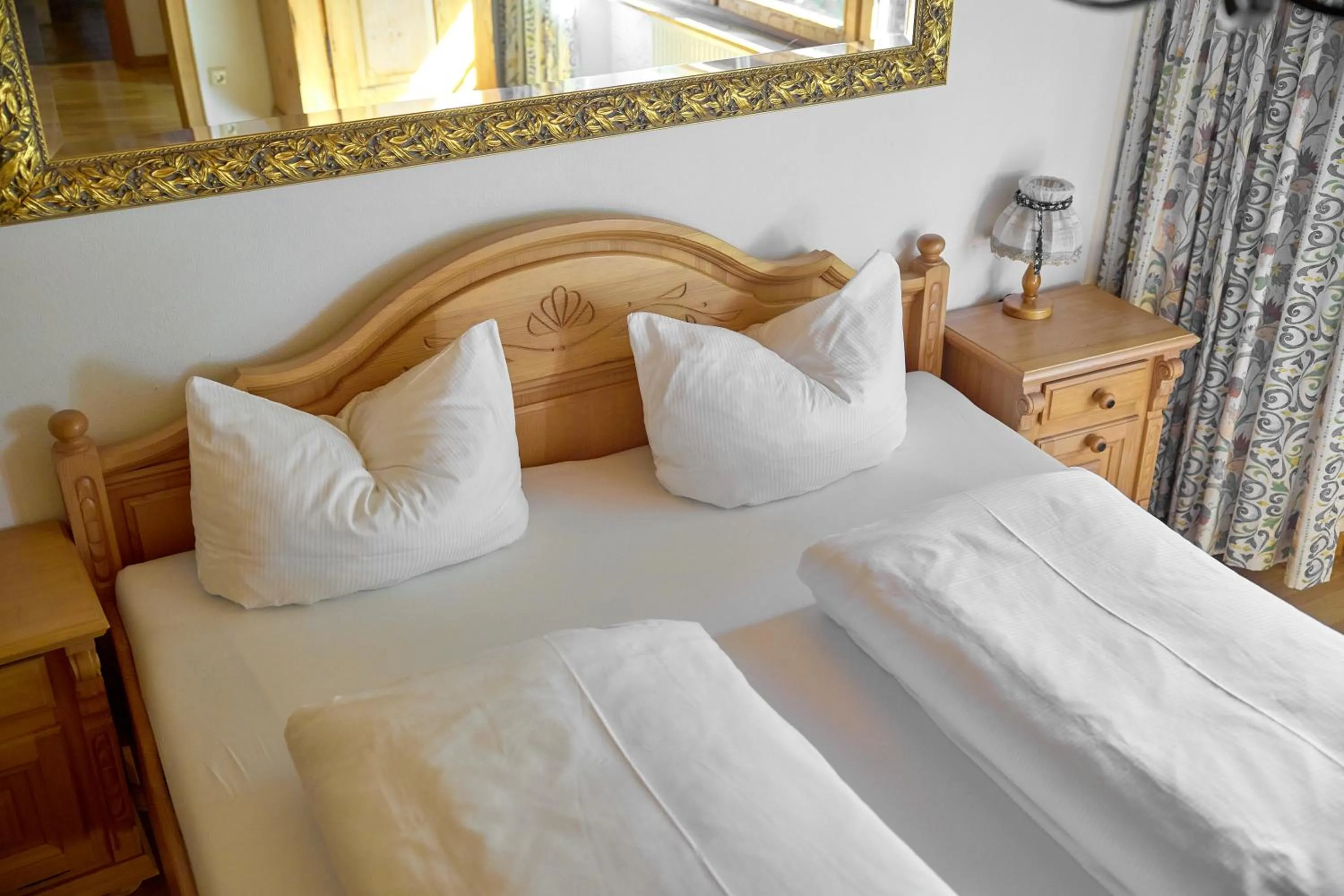 Bed in Alt Montafon Hotel Appartements by Pferd auf Wolke