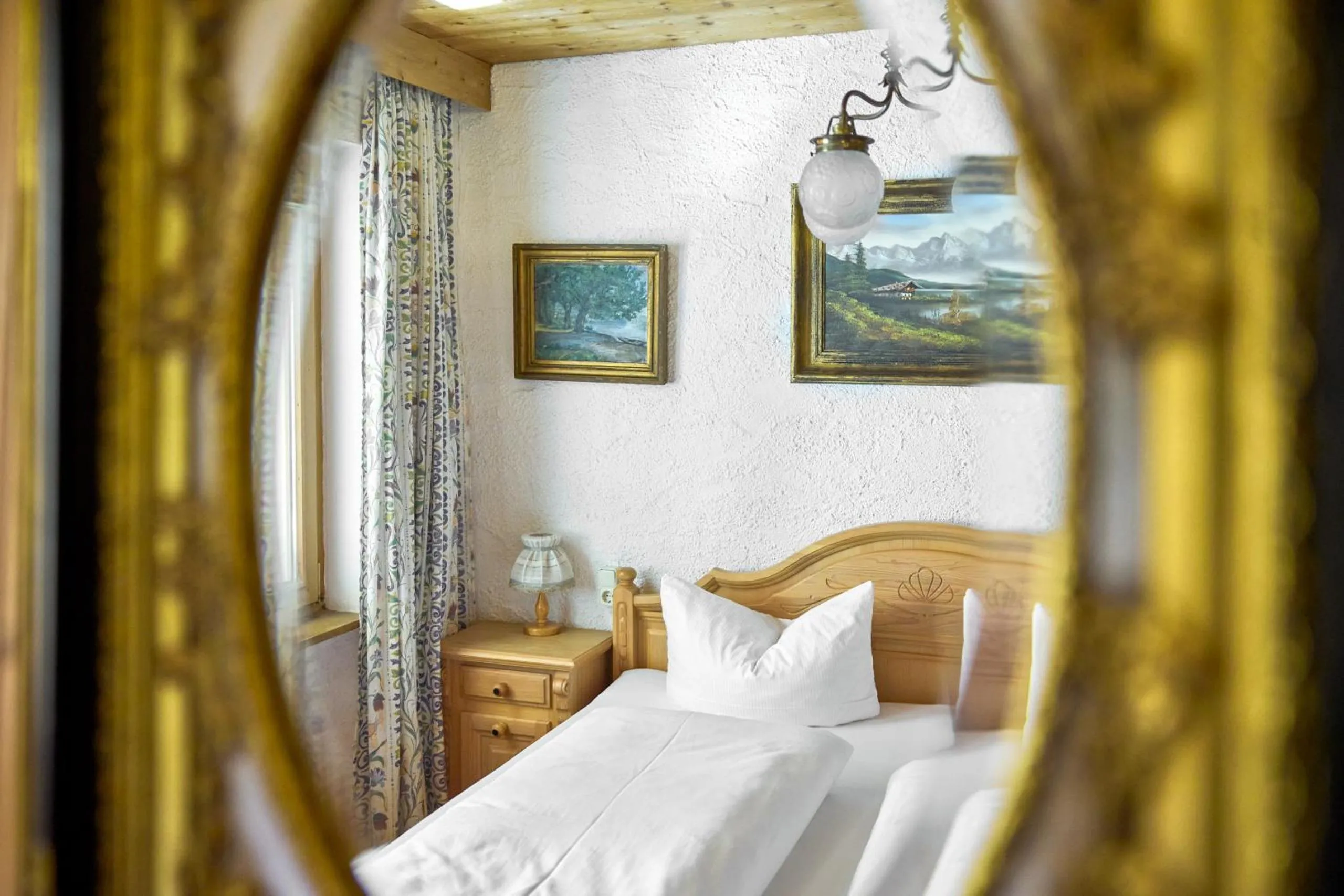 Bed in Alt Montafon Hotel Appartements by Pferd auf Wolke