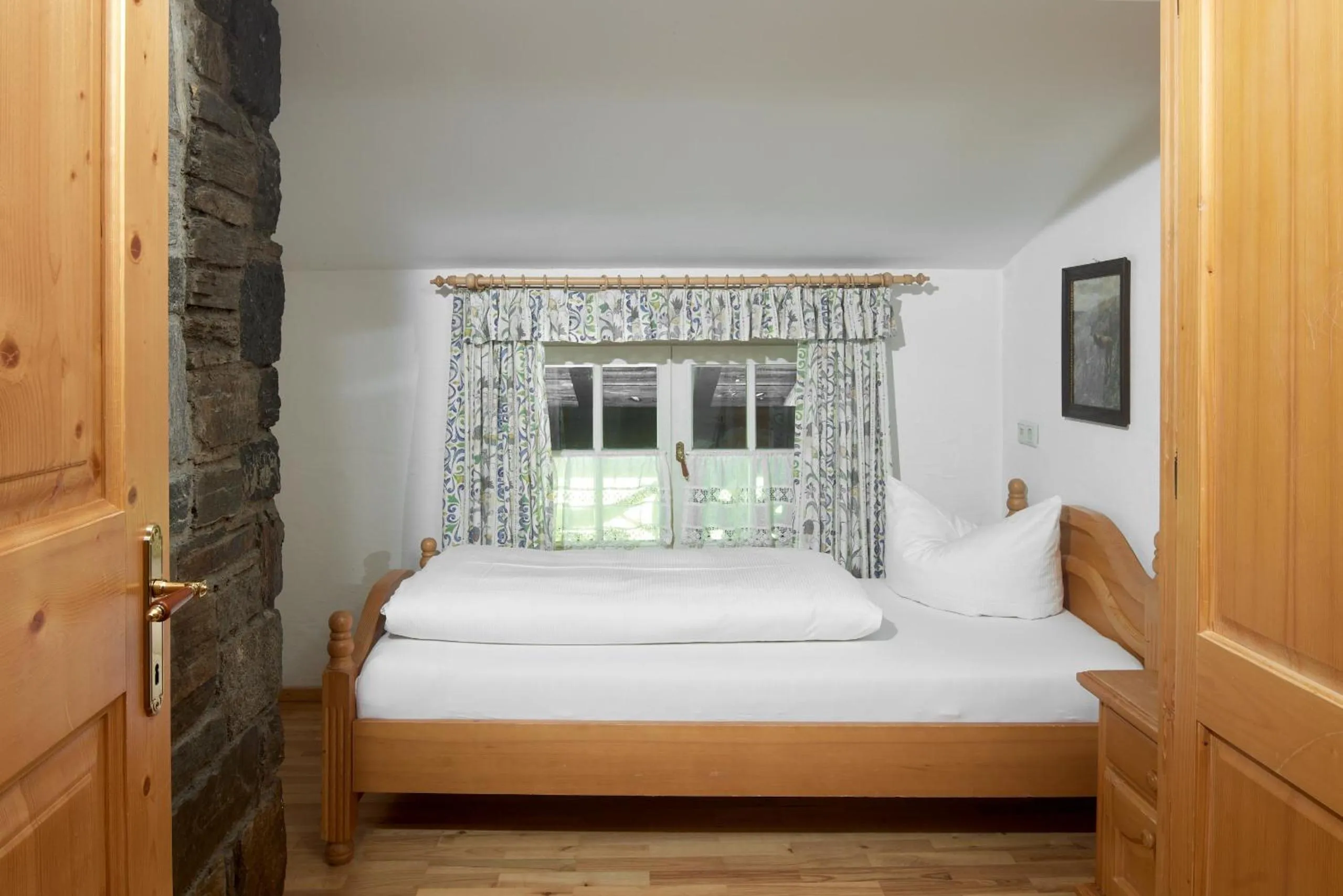 Bed in Alt Montafon Hotel Appartements by Pferd auf Wolke