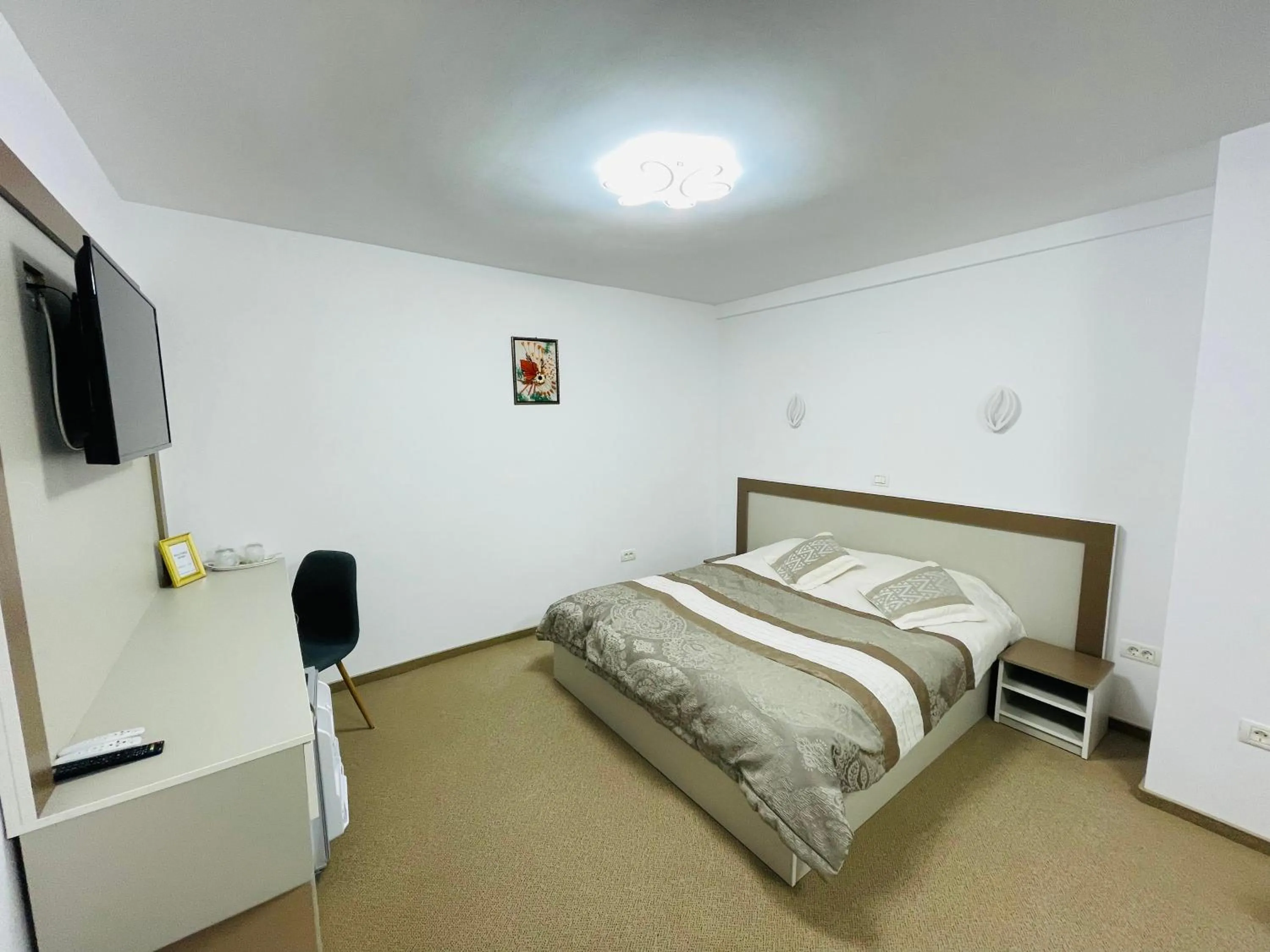 Bed in Pensiunea Sport