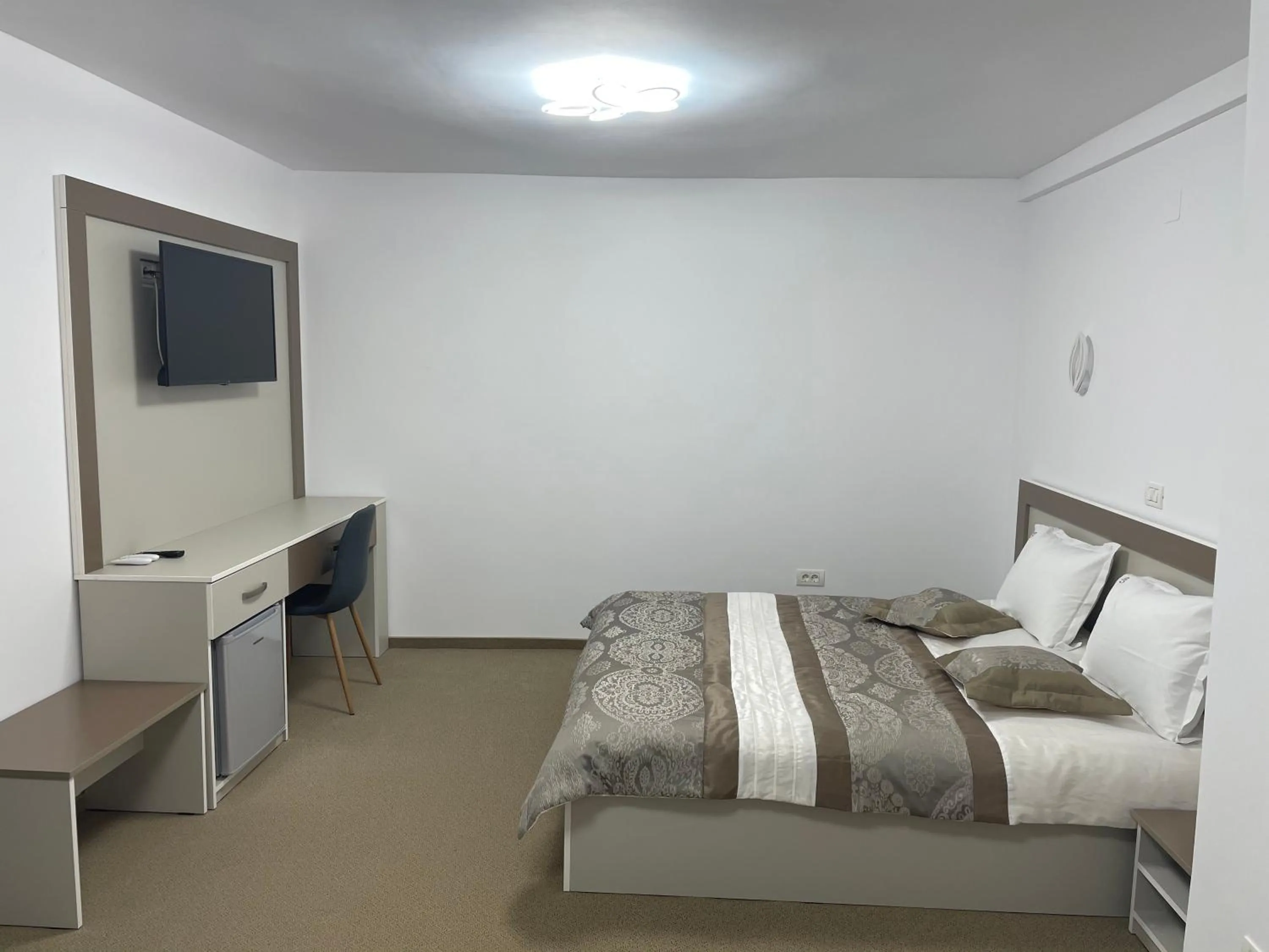 Bed in Pensiunea Sport