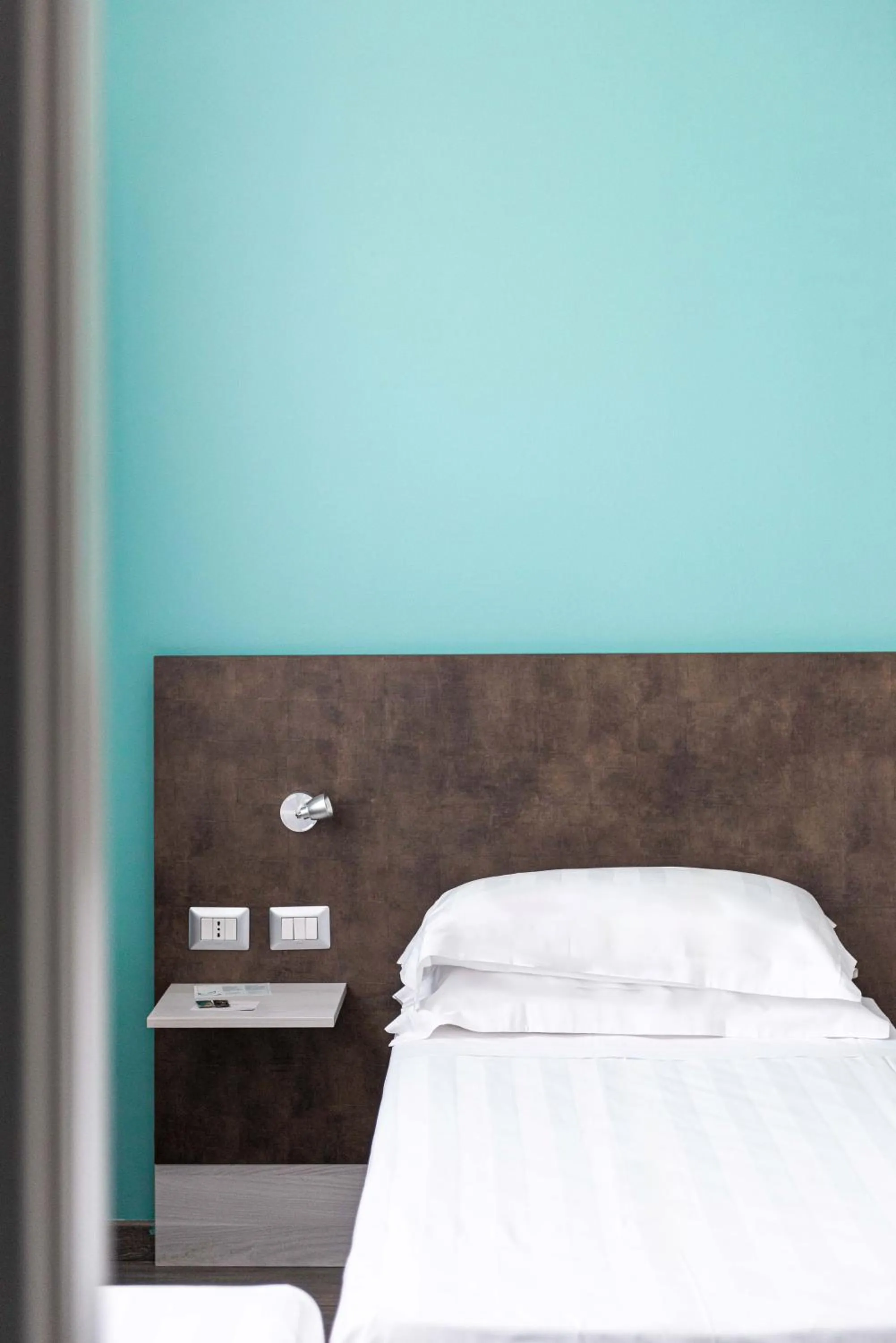 Bed in Phi Hotel Milano