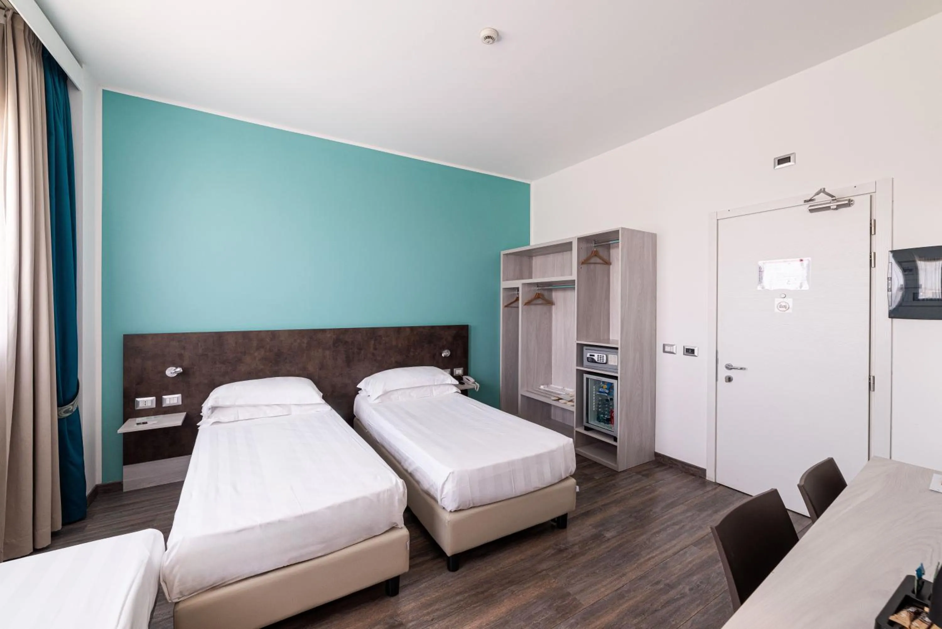 Bed in Phi Hotel Milano