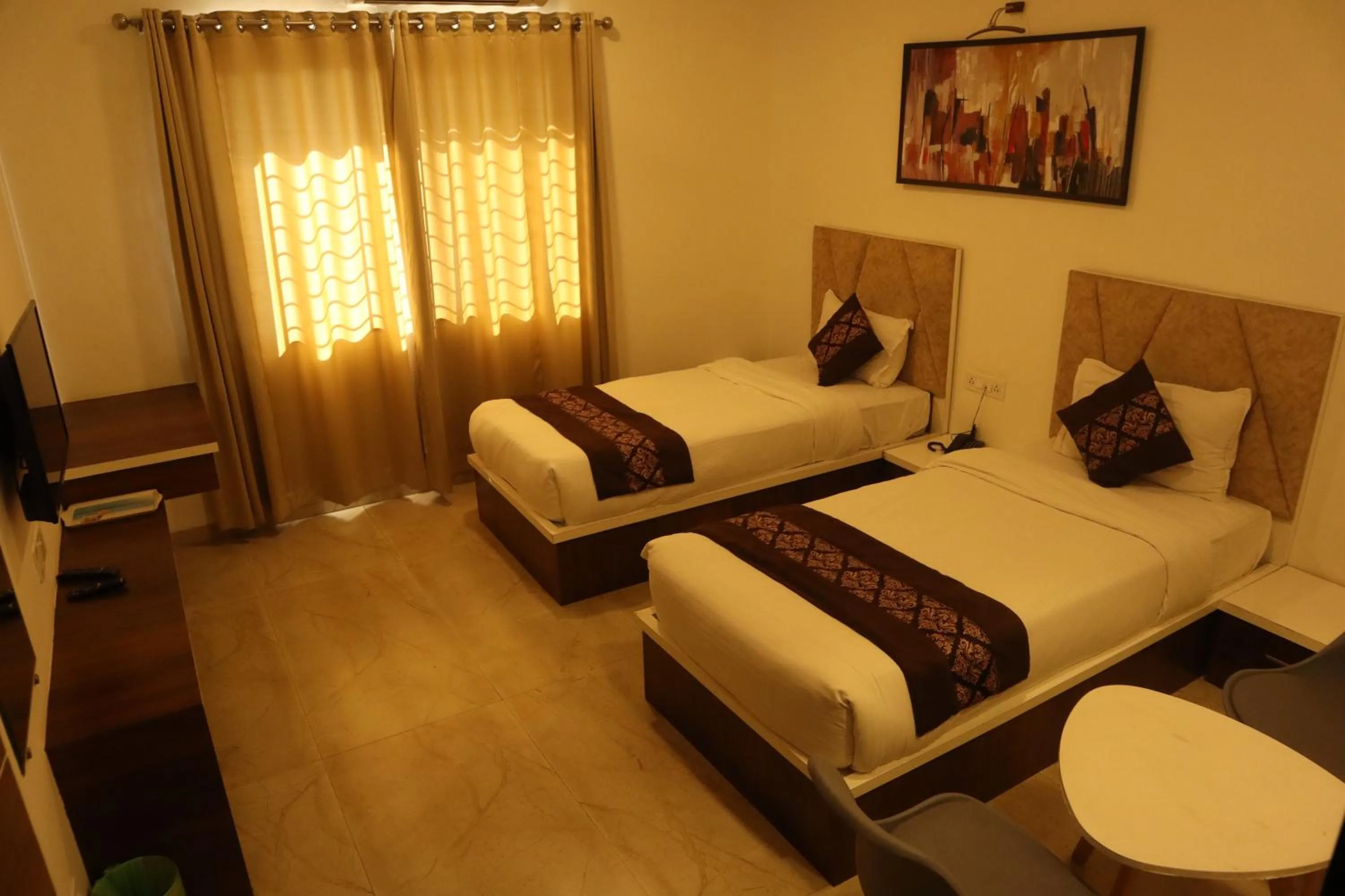 Bed in Hotel Grand Ecotel, Aurangabad