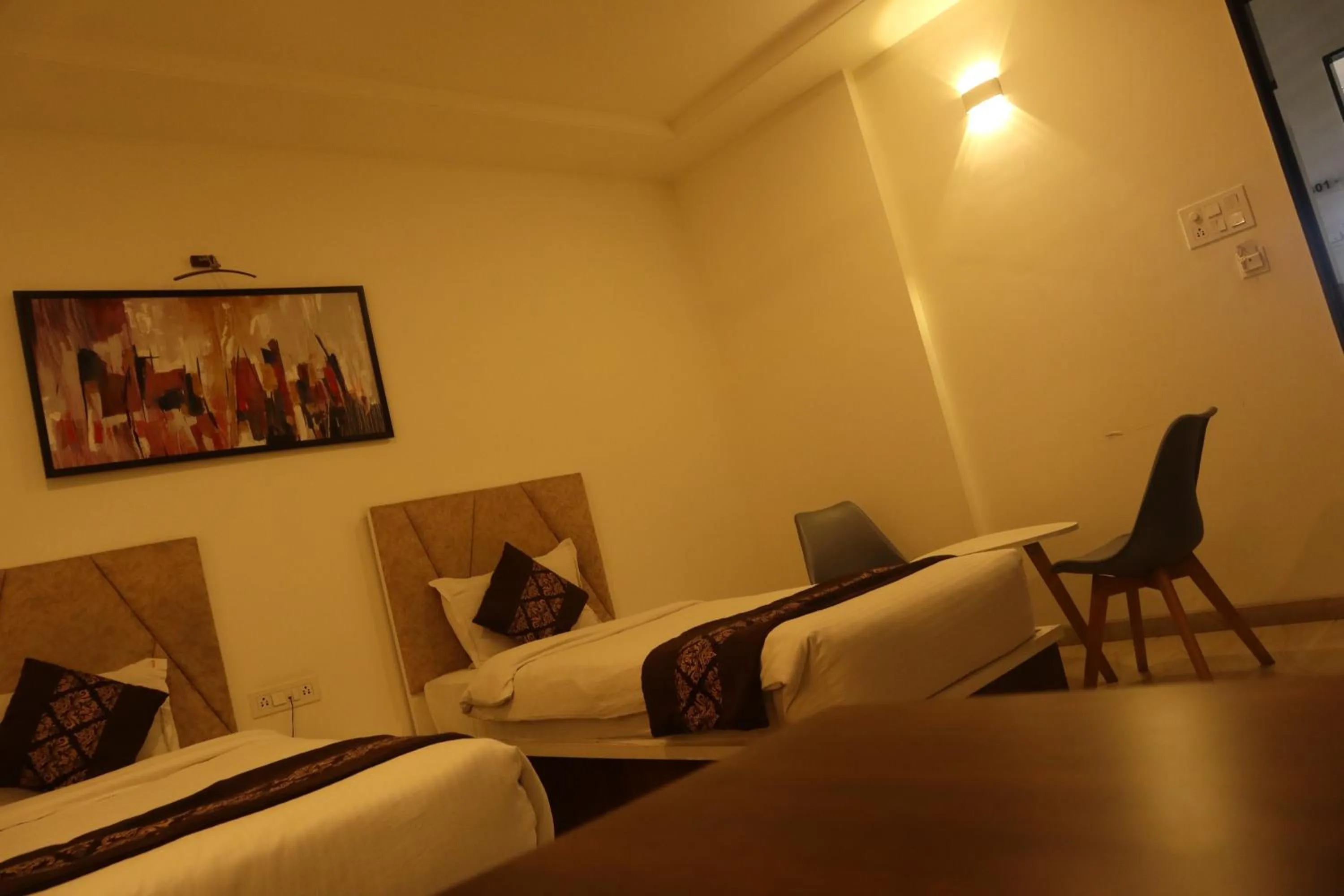 Bed in Hotel Grand Ecotel, Aurangabad