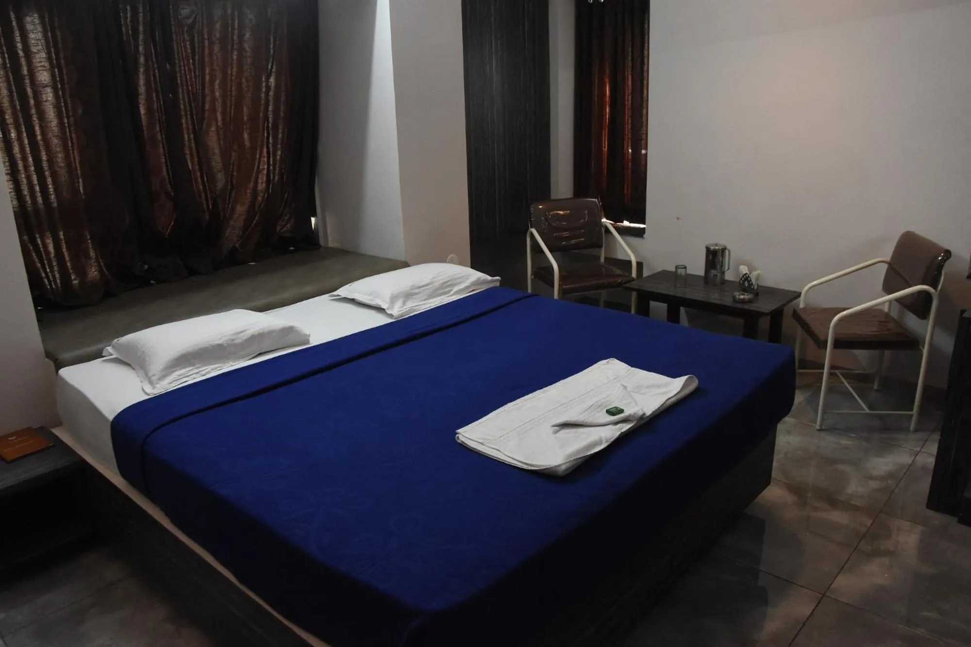 Bed in Hotel Vrindavan Deluxe Kolhapur NEAR CENTRAL BUS STAND