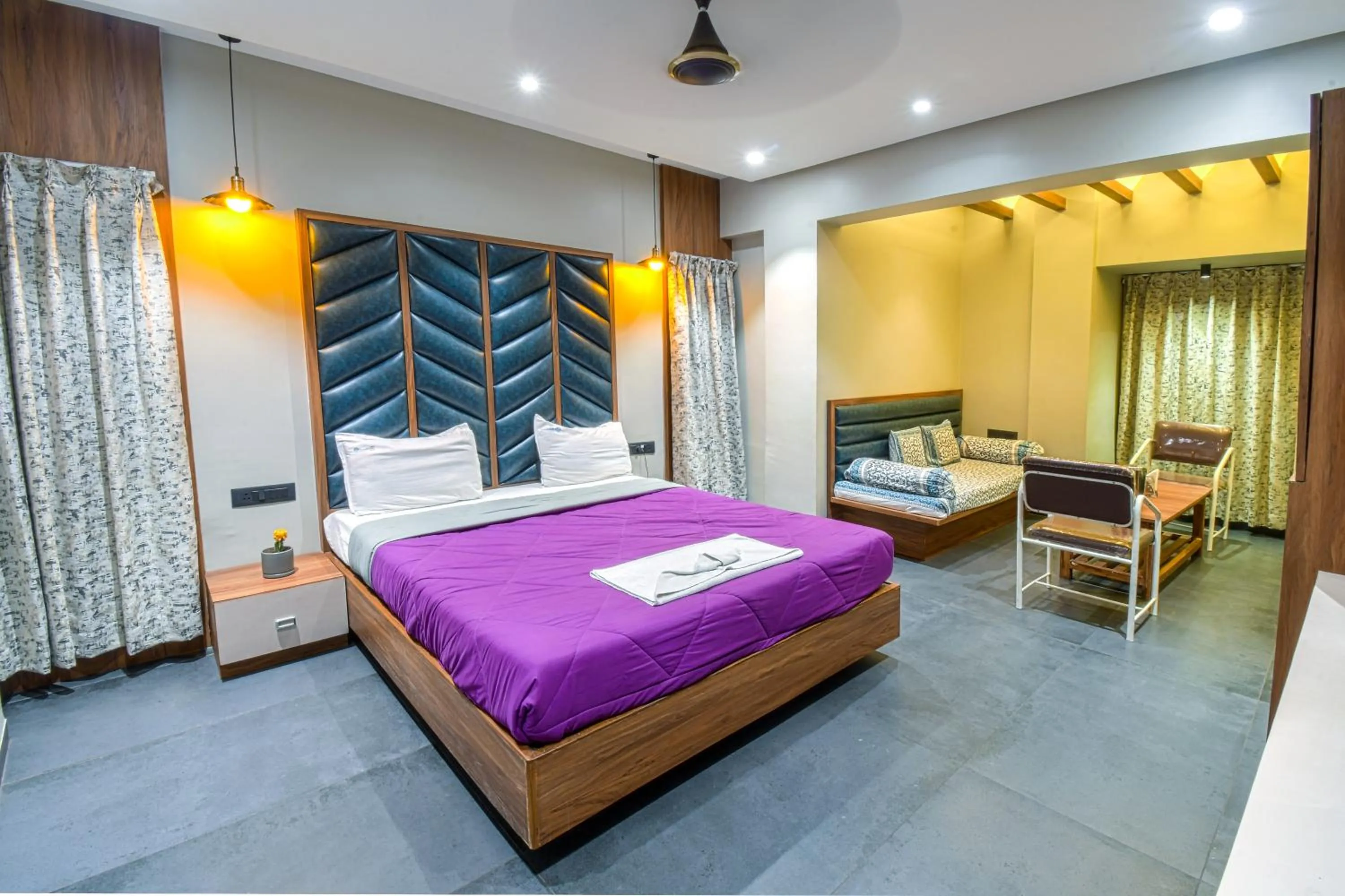 Bed in Hotel Vrindavan Deluxe Kolhapur NEAR CENTRAL BUS STAND