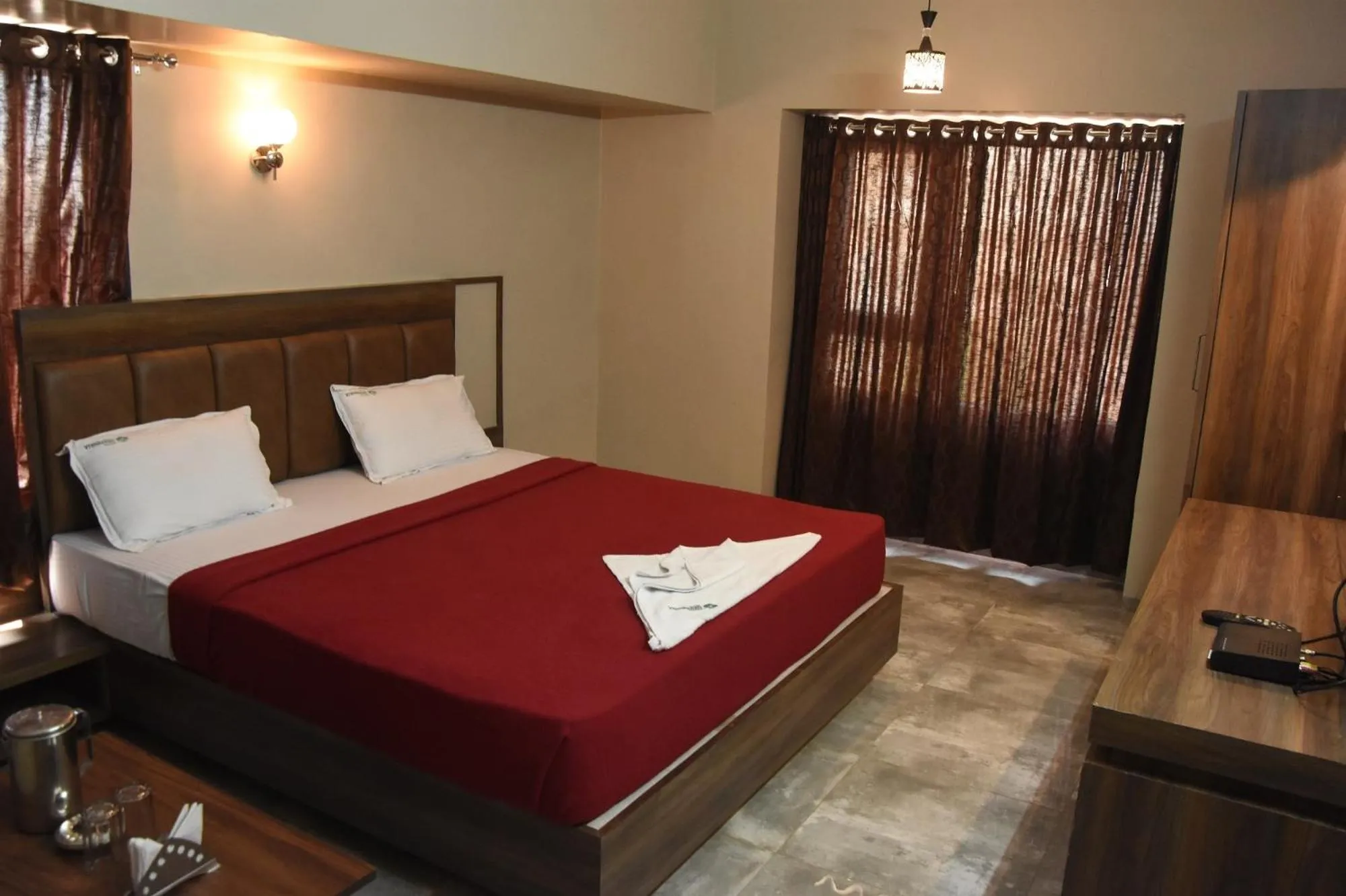 Bed in Hotel Vrindavan Deluxe Kolhapur NEAR CENTRAL BUS STAND