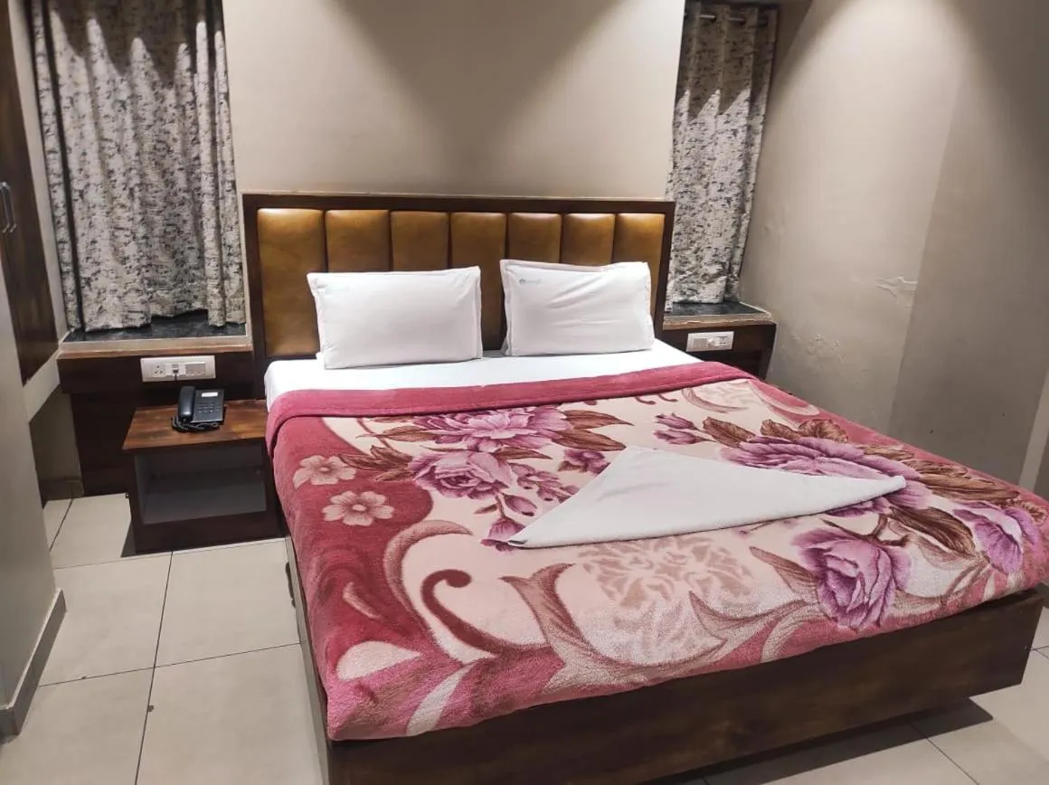 Bed in Hotel Vrindavan Deluxe Kolhapur NEAR CENTRAL BUS STAND