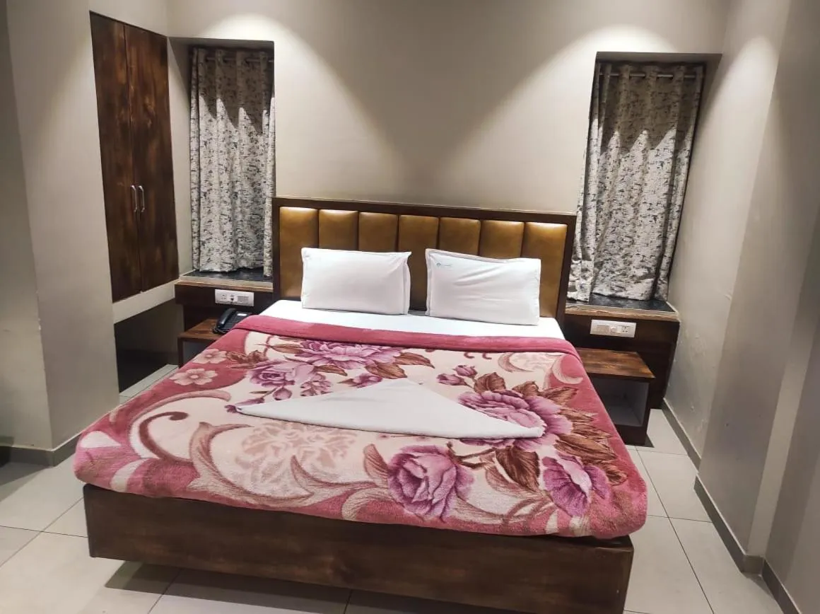 Bed in Hotel Vrindavan Deluxe Kolhapur NEAR CENTRAL BUS STAND