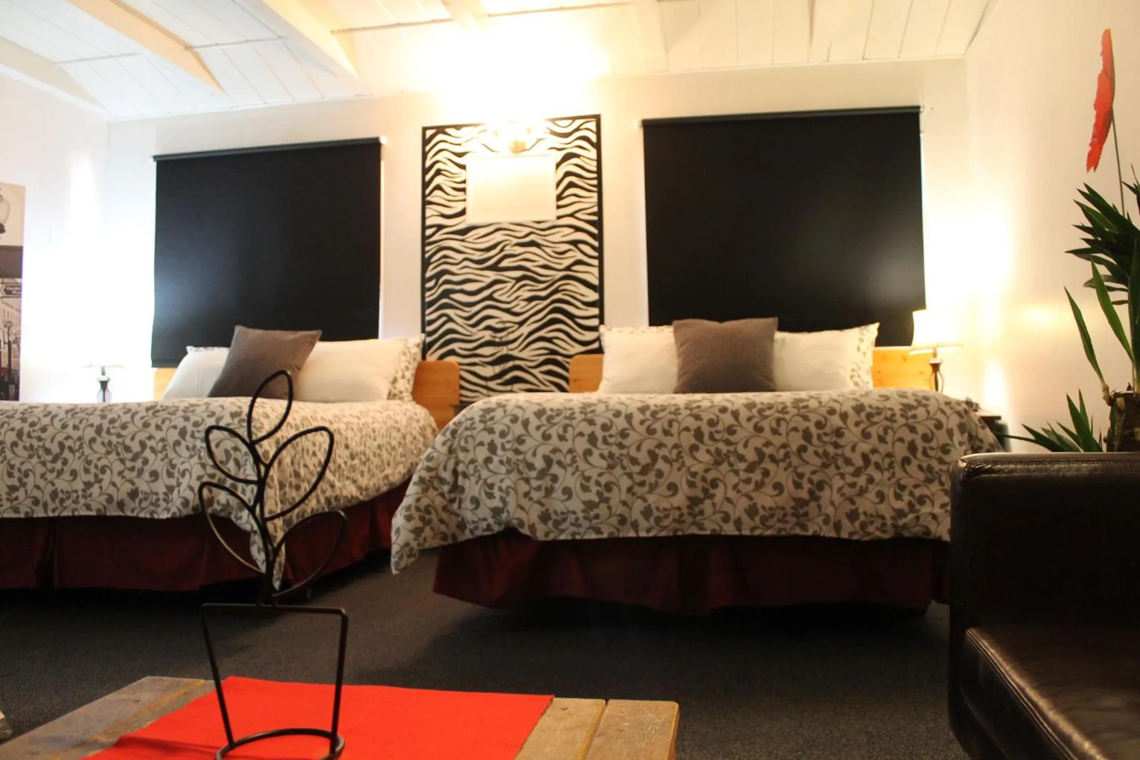 Bed in Sage Hills Motel