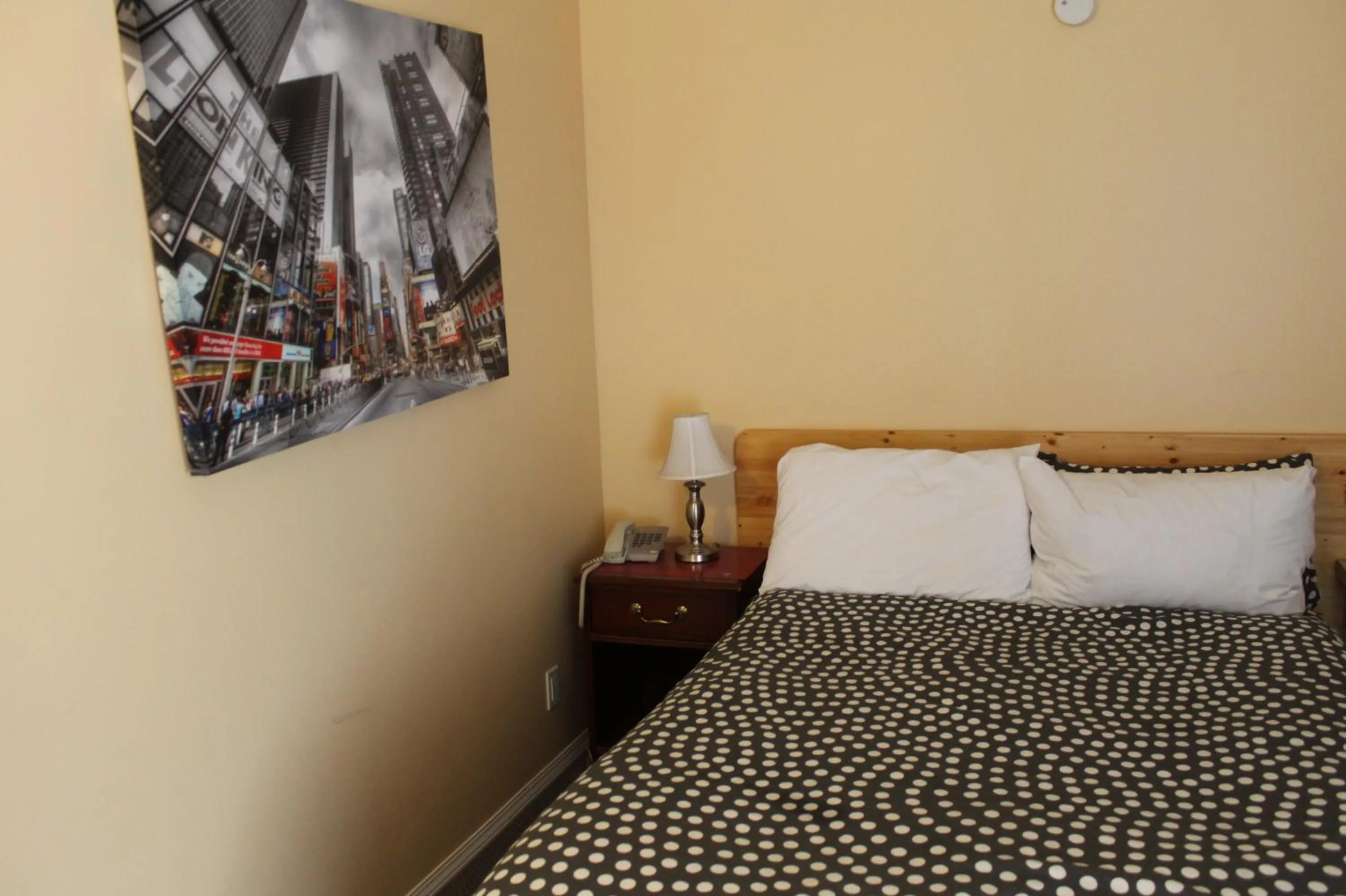 Bed in Sage Hills Motel