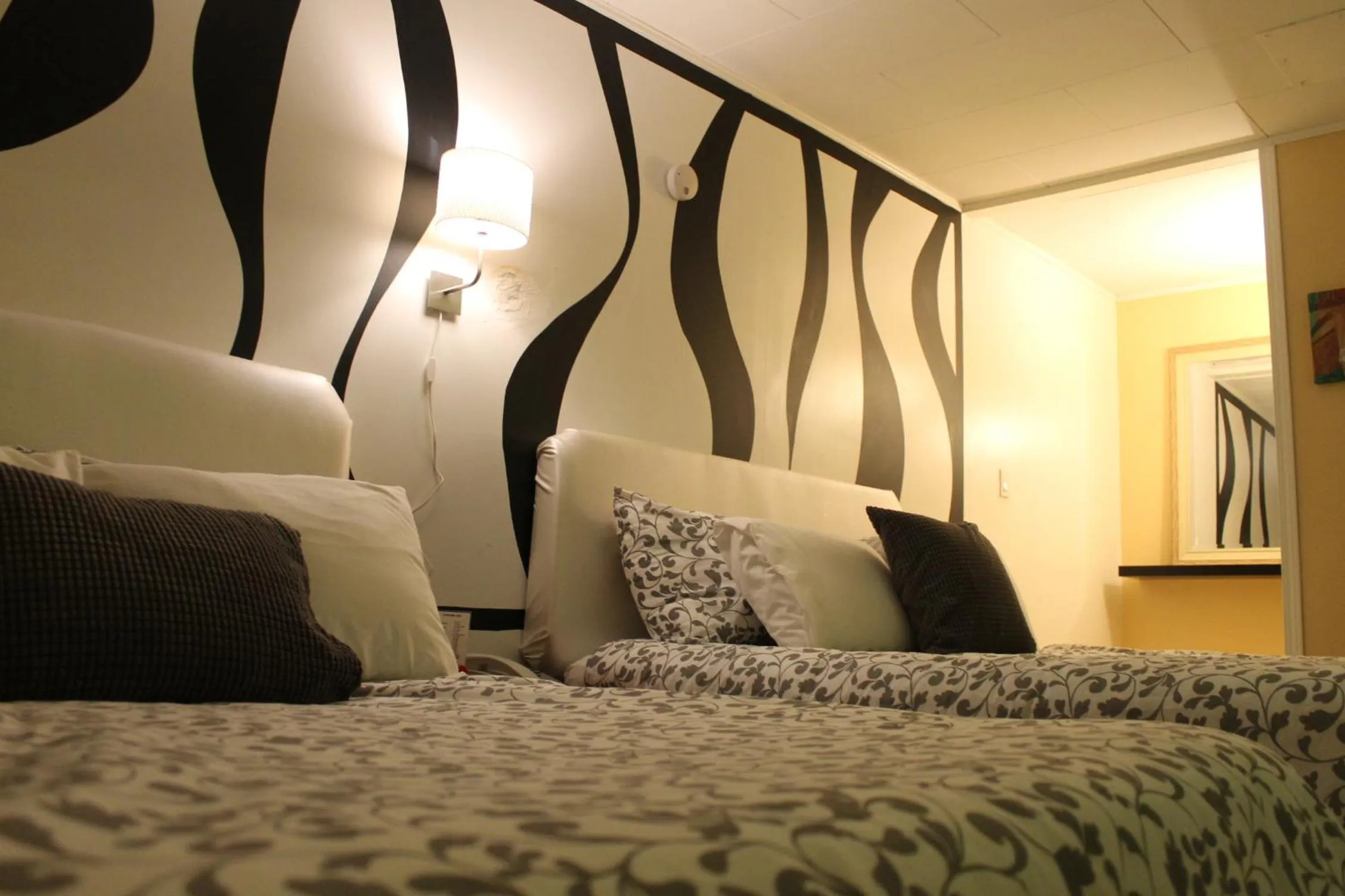 Bed in Sage Hills Motel