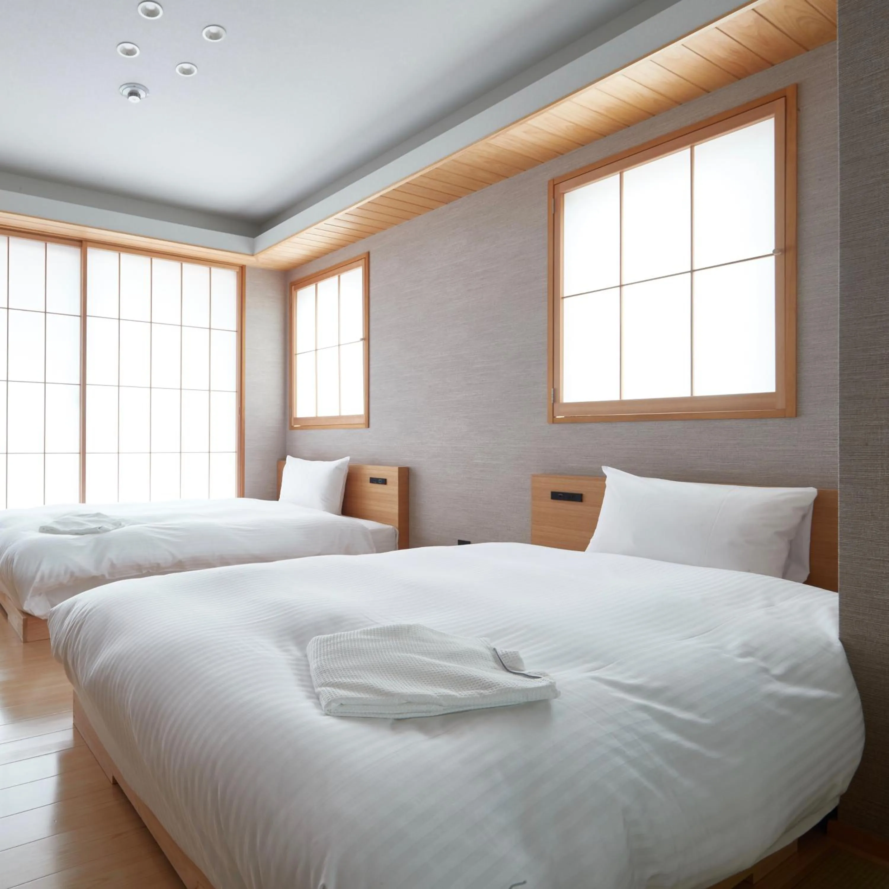 Bed in KAMAKURA Hotel