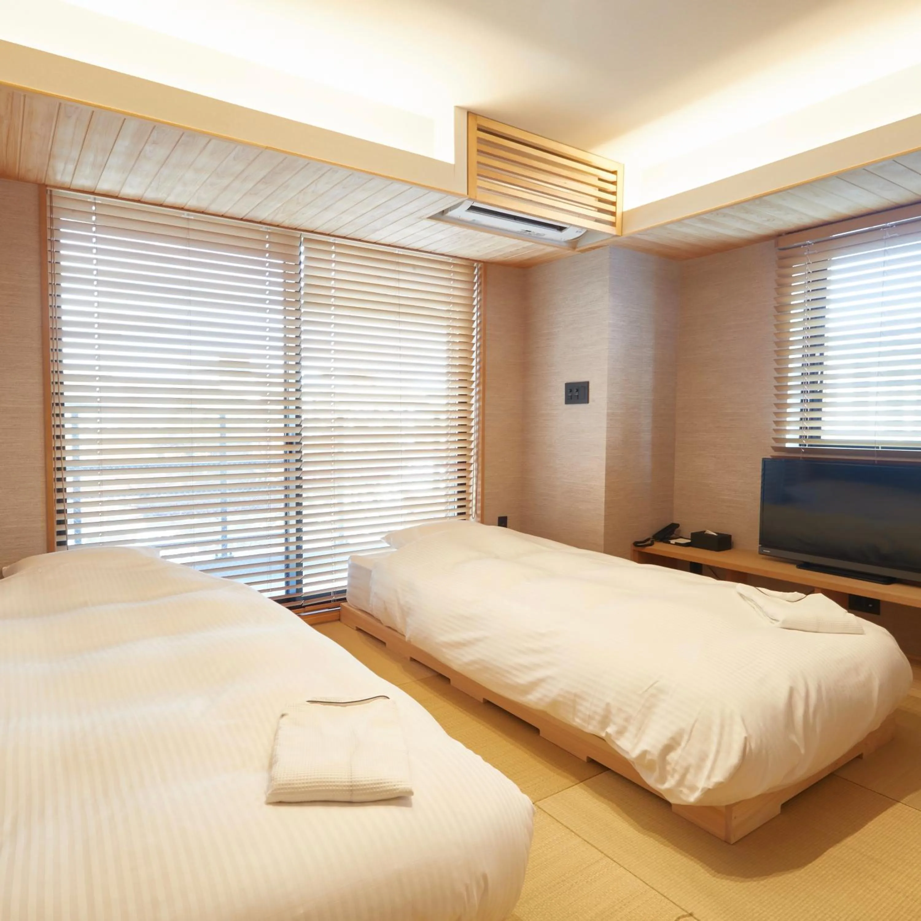 Bed in KAMAKURA Hotel