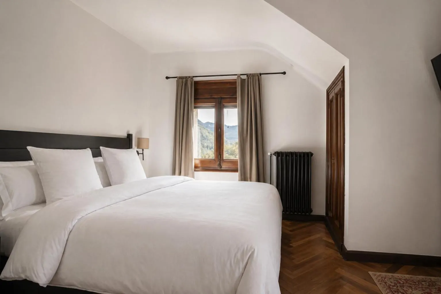 Bed in Angelats Hotel - A Signature Boutique Hotel
