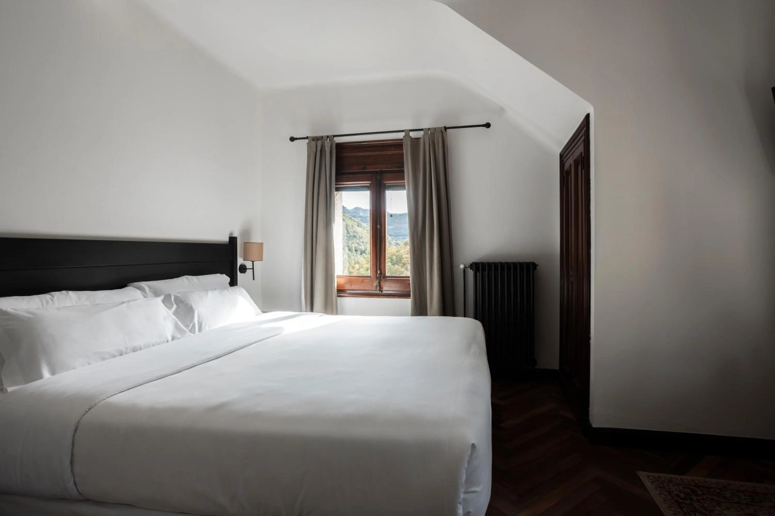 Property building, Bed in Angelats Hotel - A Signature Boutique Hotel