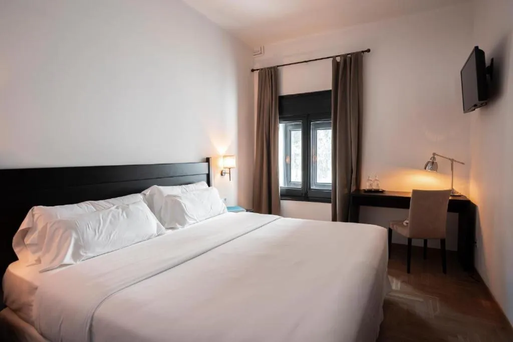 Bed in Angelats Hotel - A Signature Boutique Hotel