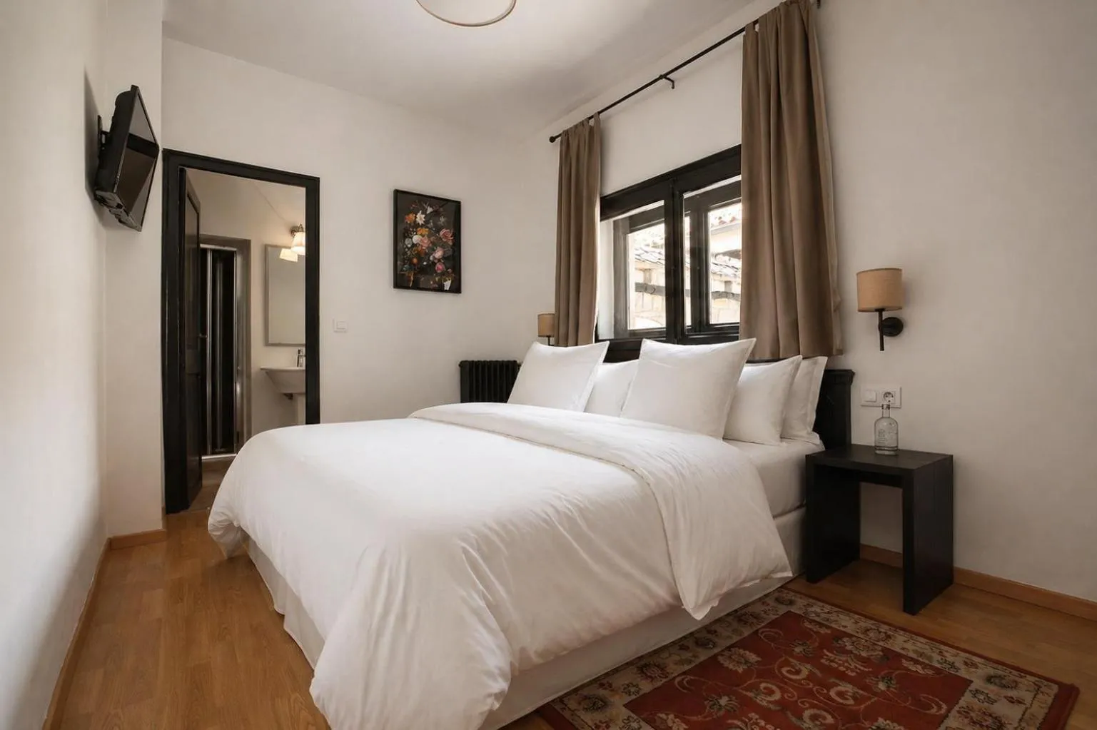 Bed in Angelats Hotel - A Signature Boutique Hotel