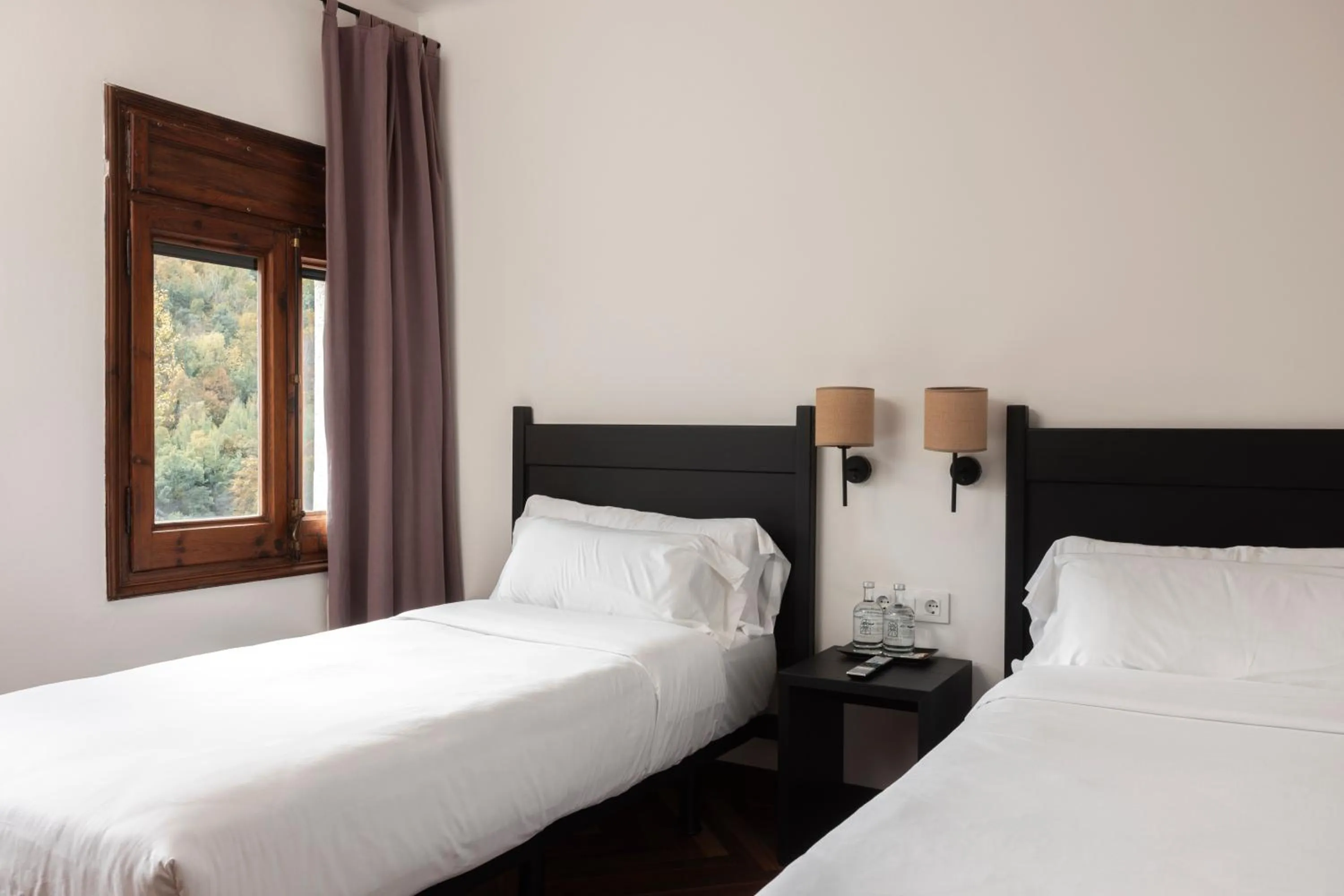 Property building, Bed in Angelats Hotel - A Signature Boutique Hotel