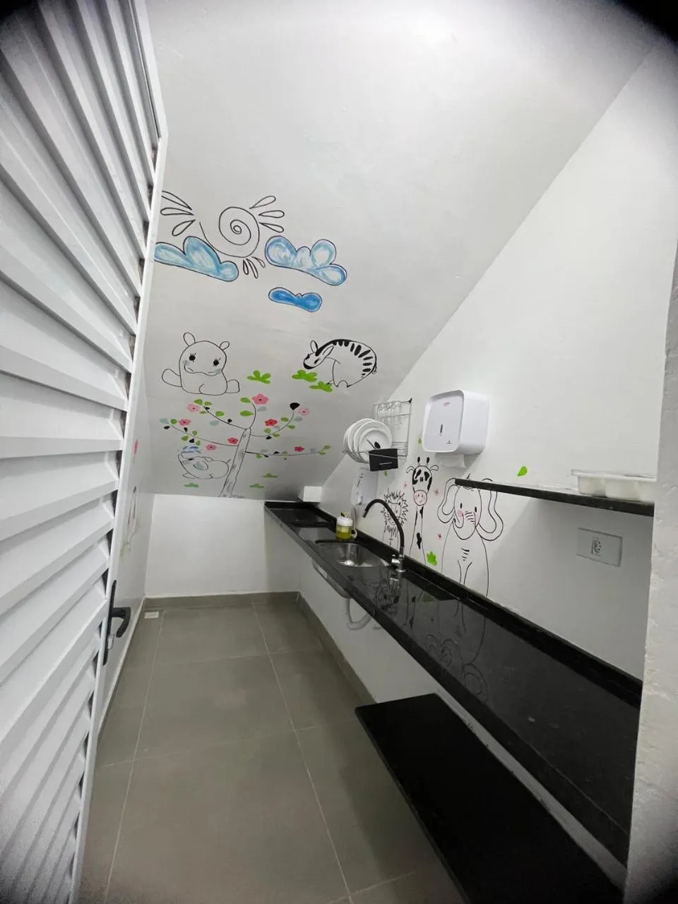 Kitchen or kitchenette in Leviv Praia Hotel