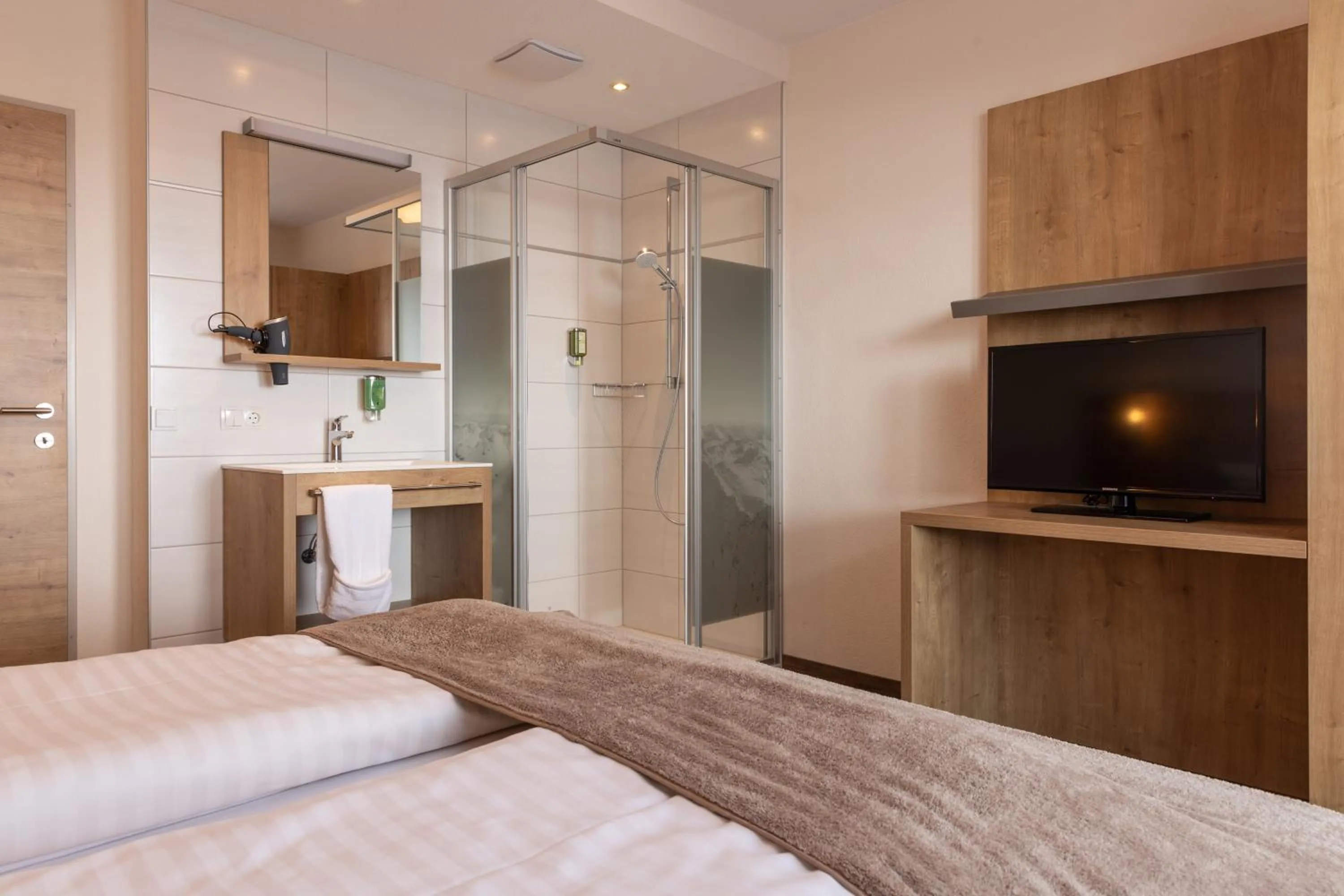 Shower, Bed in Pitztal Living Apartments