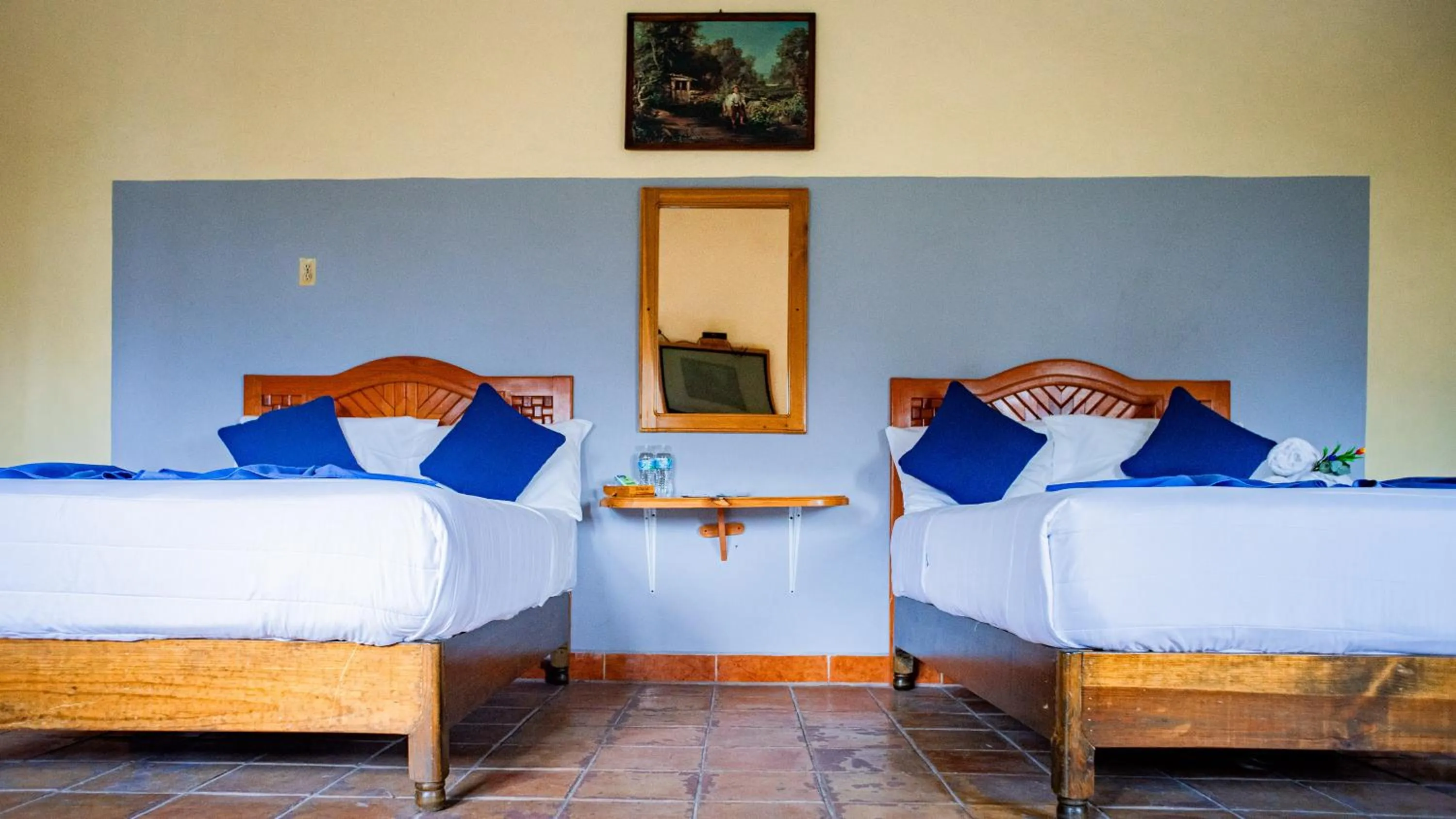 Bed in HOTEL EX HACIENDA EL MOLINO