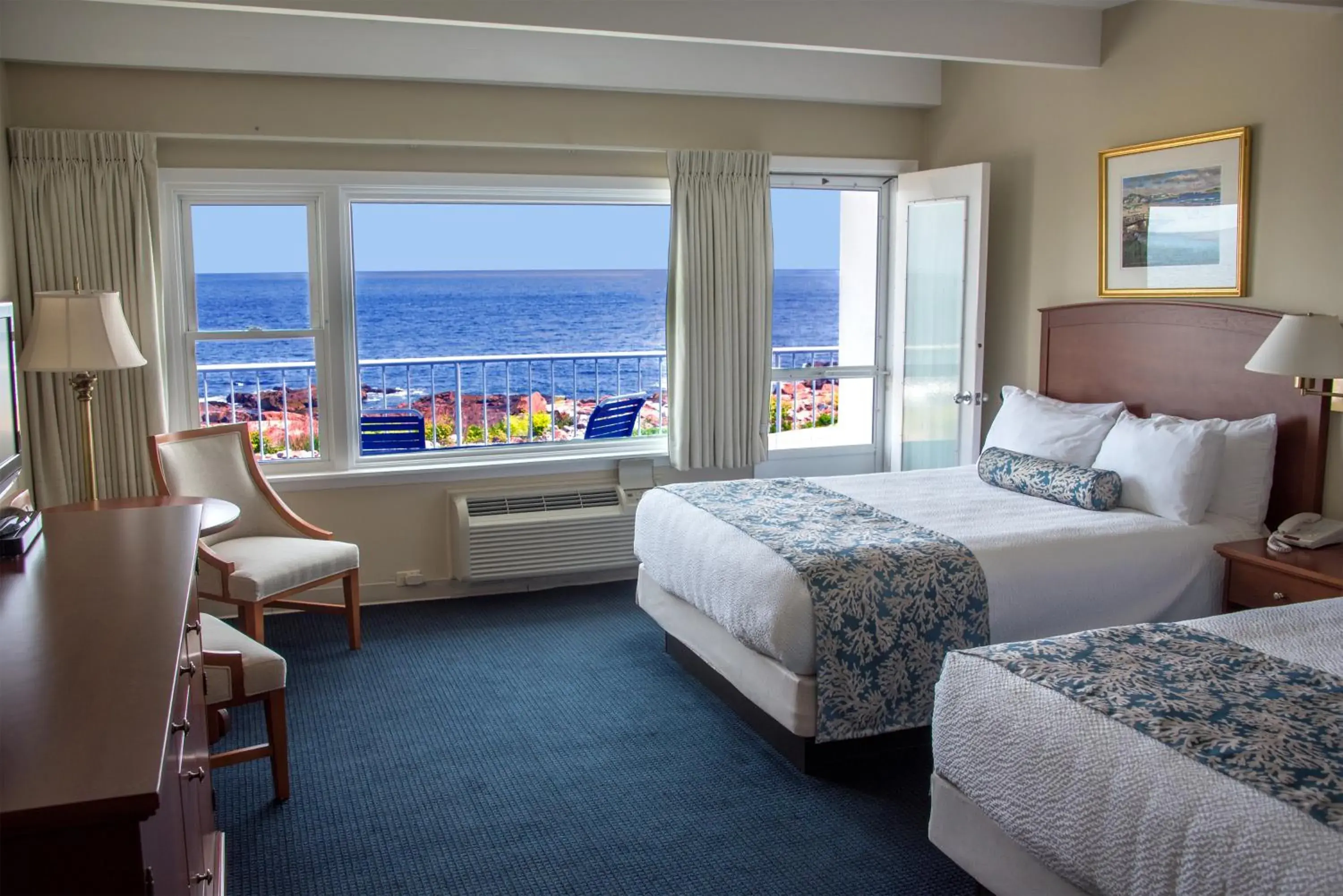 Deluxe Queen Room with Two Queen Beds with Balcony and Ocean View - single occupancy in Atlantis Oceanfront Inn Gloucester Deluxe Queen Room with Two Queen Beds with Balcony and Ocean View - single occupancy in Atlantis Oceanfront Inn Gloucester