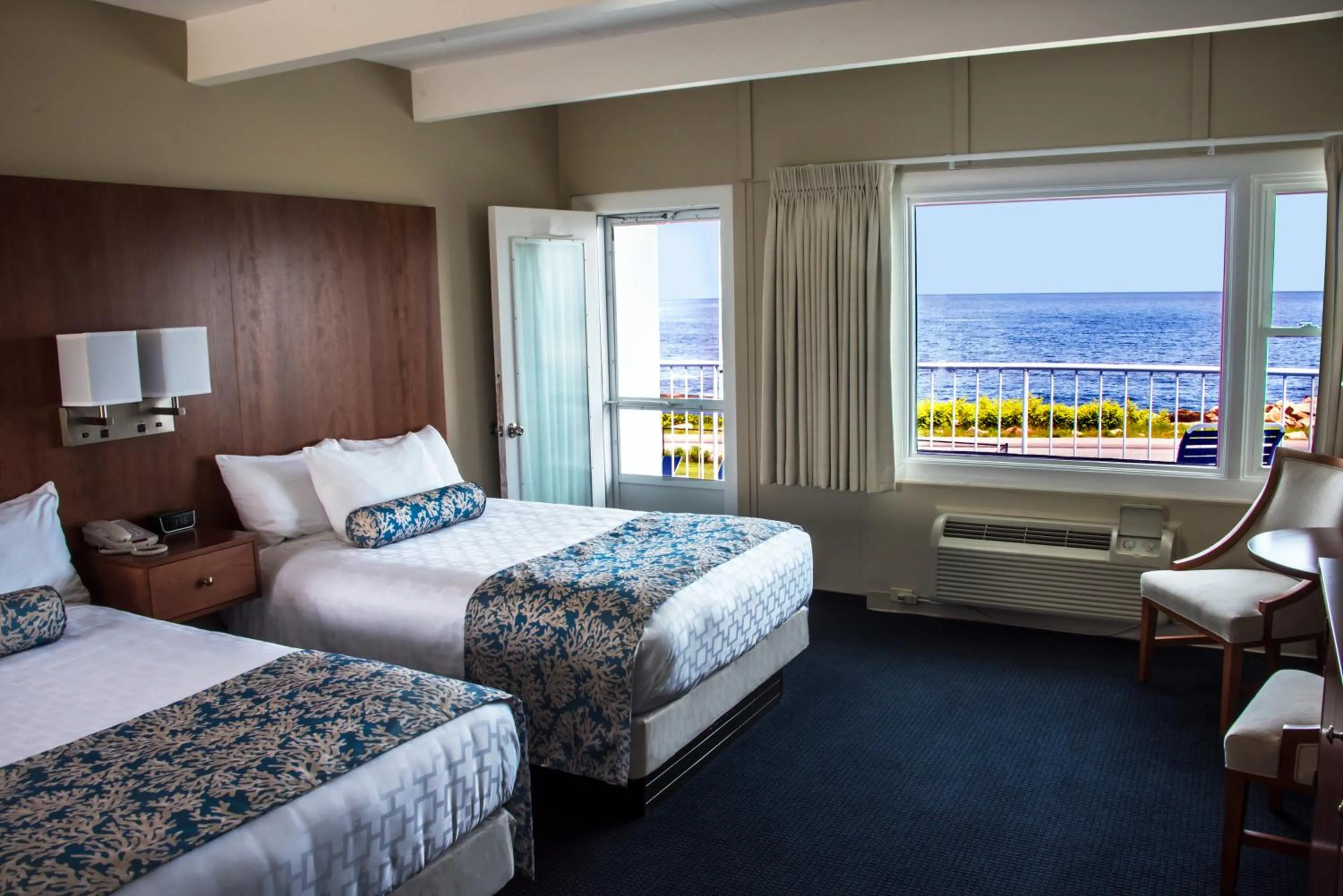 Bed in Atlantis Oceanfront Inn Gloucester