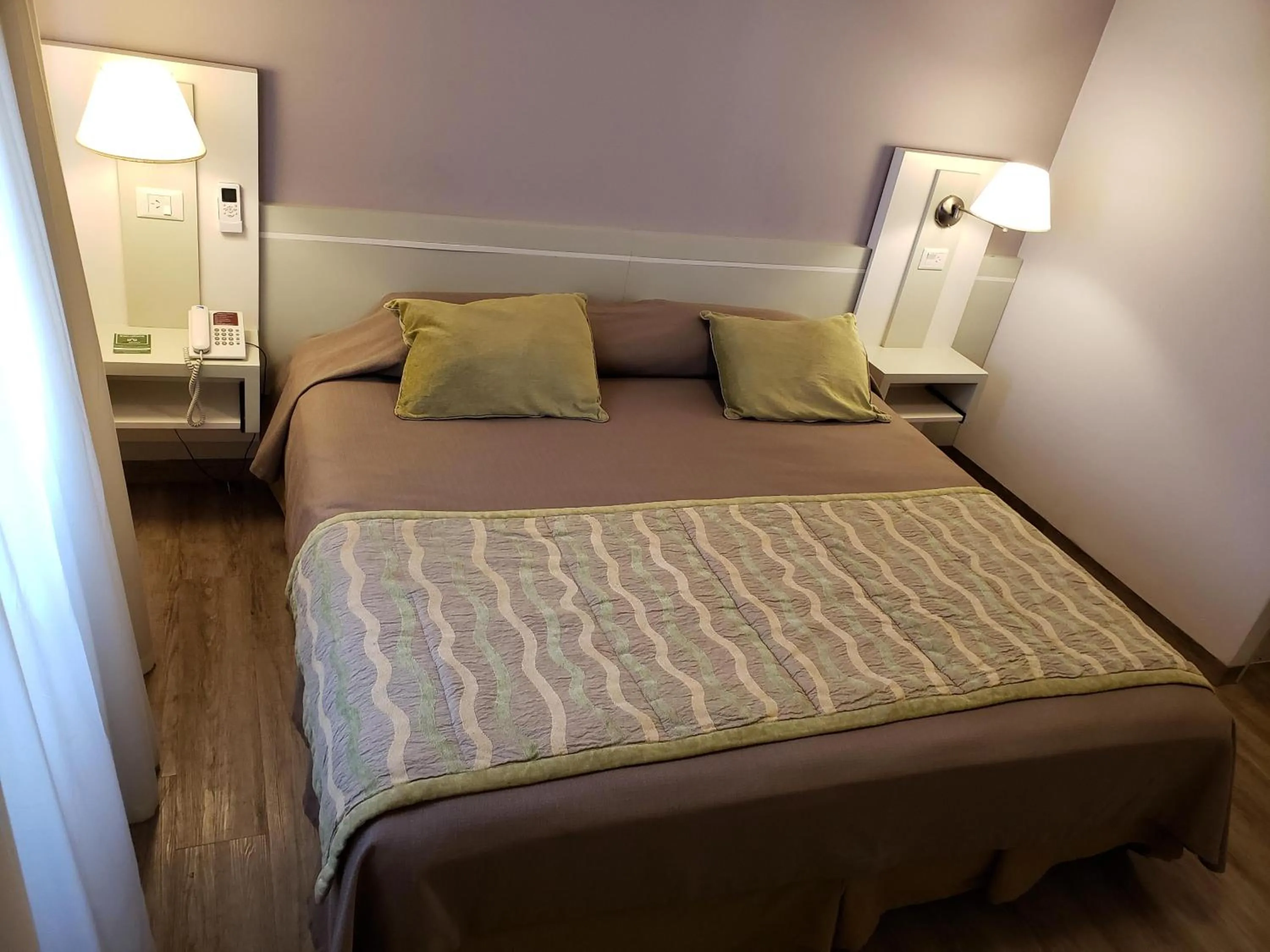 Bed in Hotel Continental