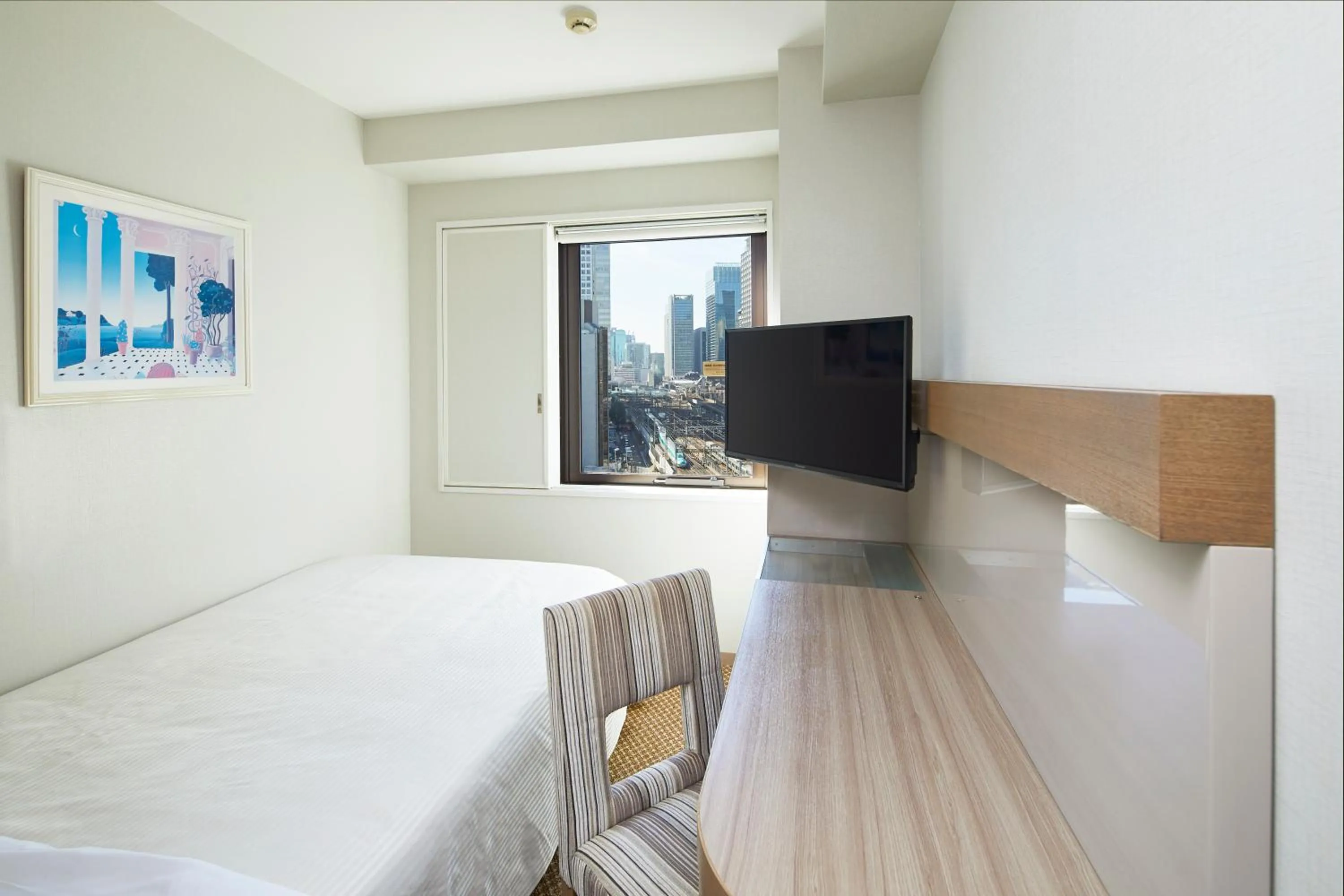 Bed in Keio Presso Inn Otemachi