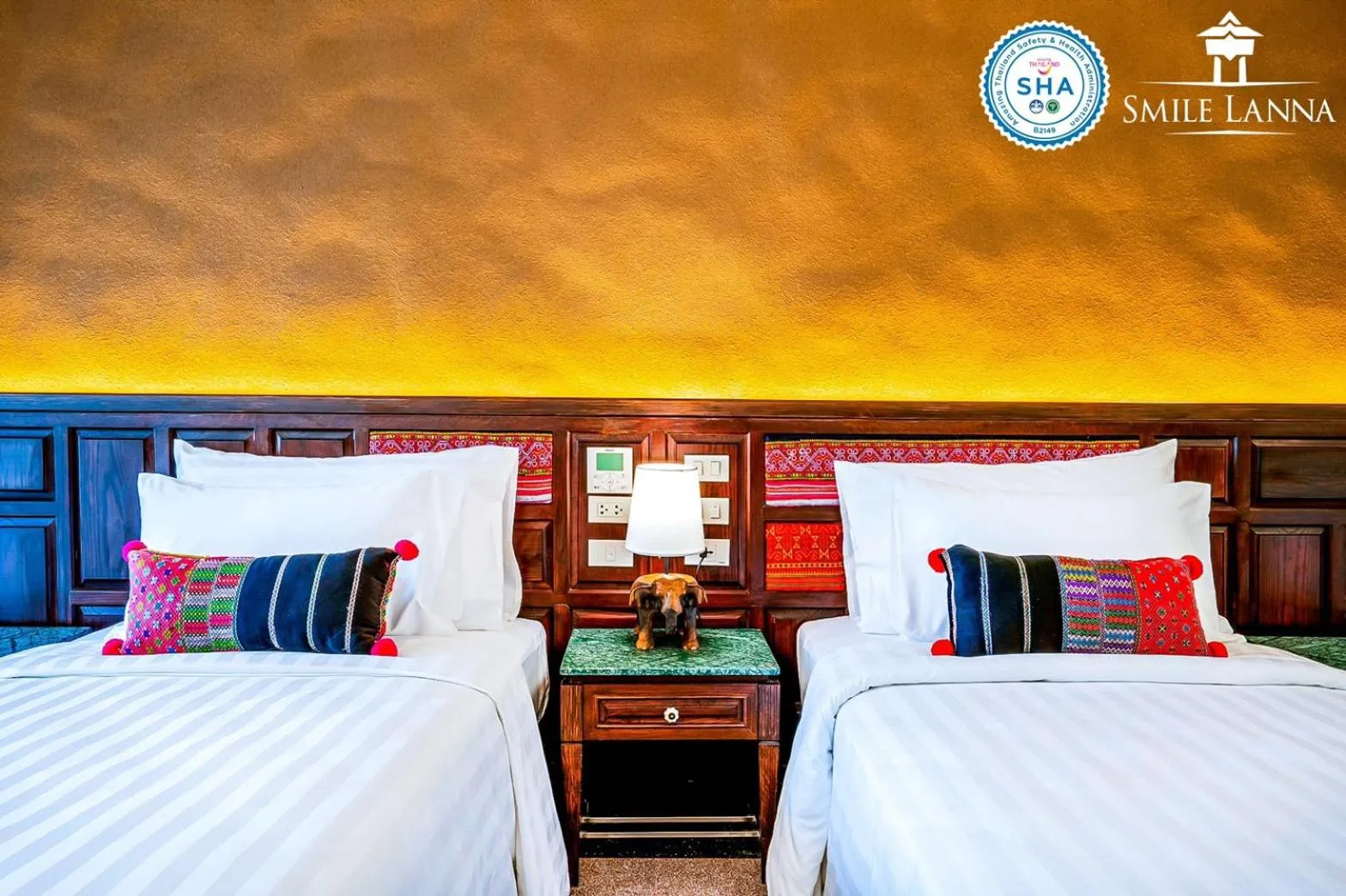 Bed in Smile Lanna Hotel