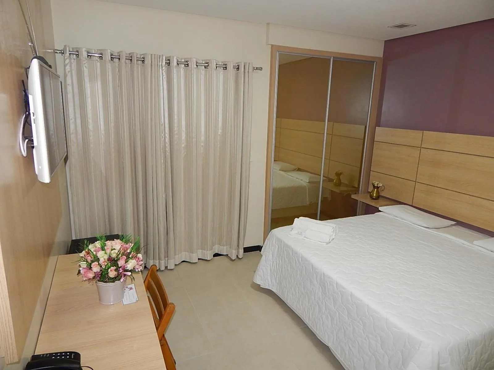 Bed in Hotel Oceania