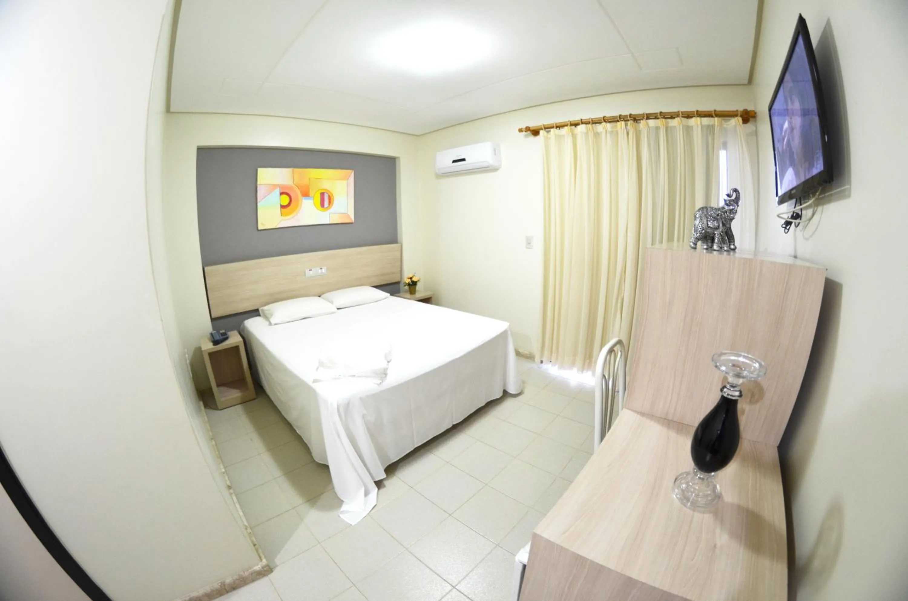 Bed in Hotel Oceania