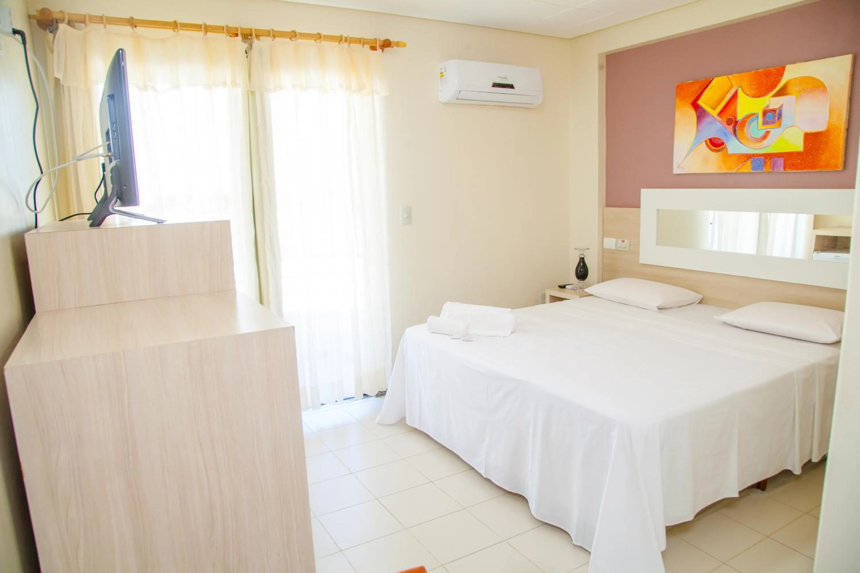 Bed in Hotel Oceania