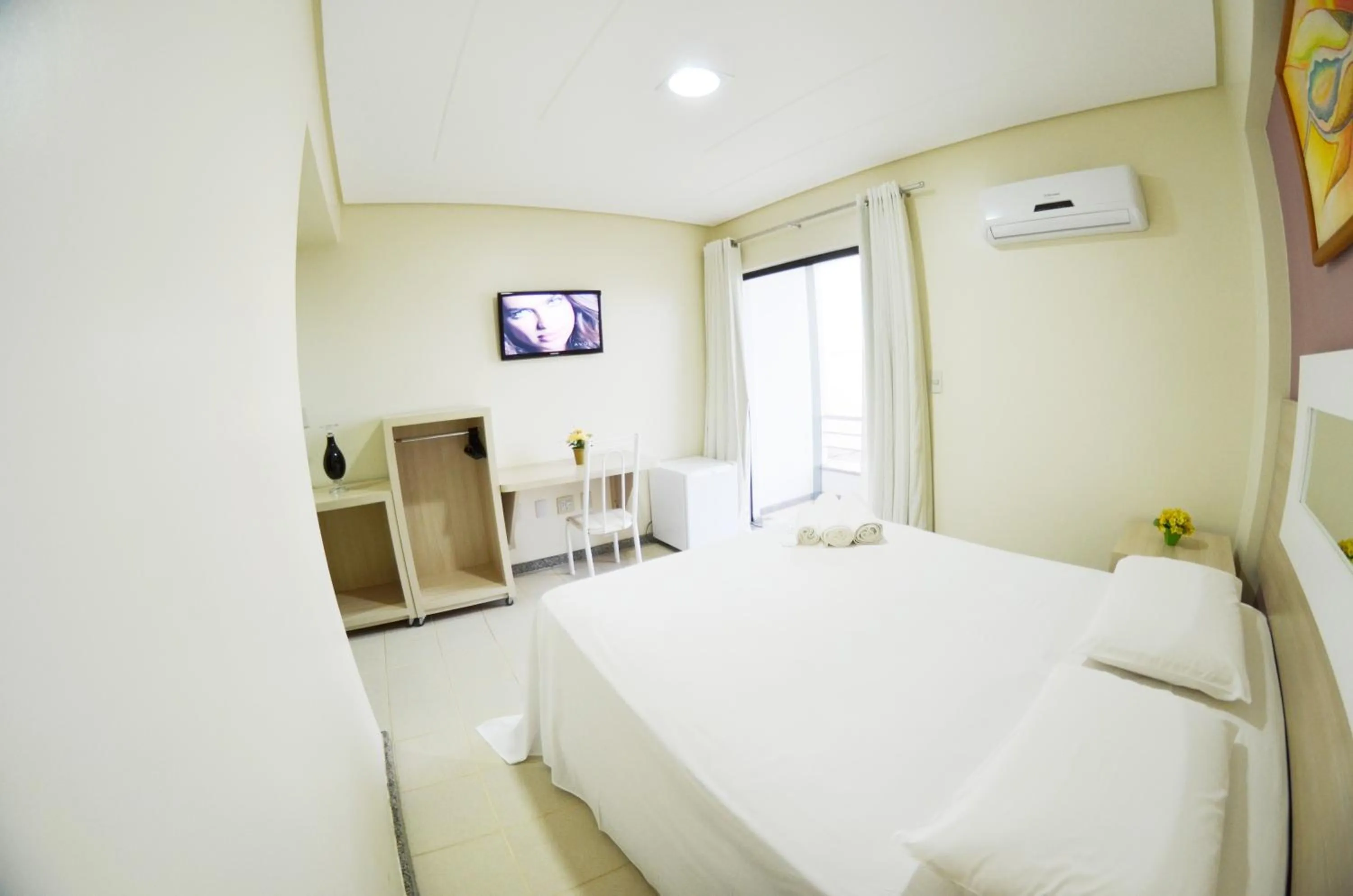 Bed in Hotel Oceania