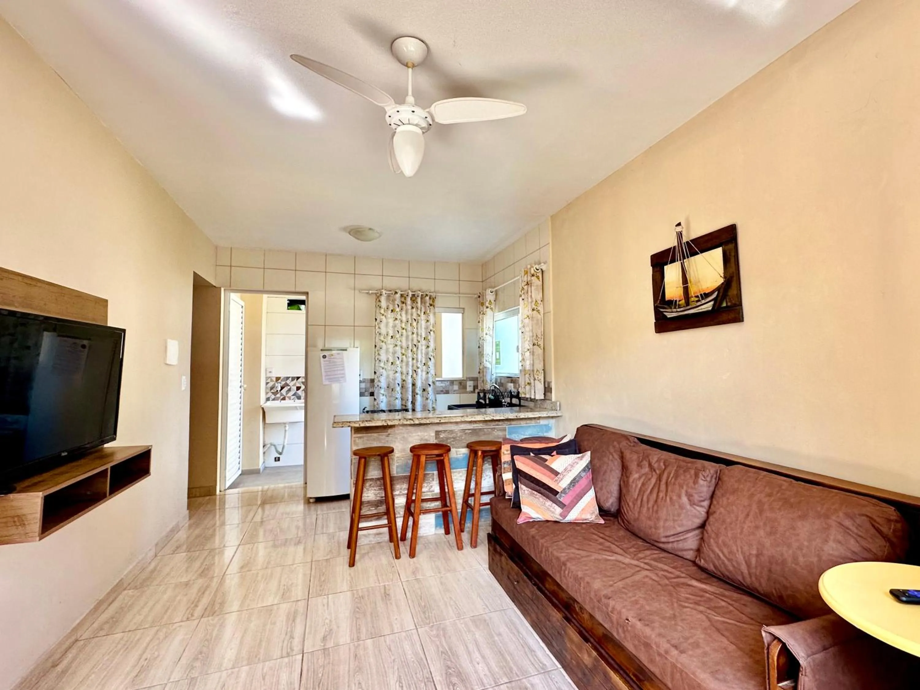 Communal lounge/ TV room in Pousada Lagoa Encantada