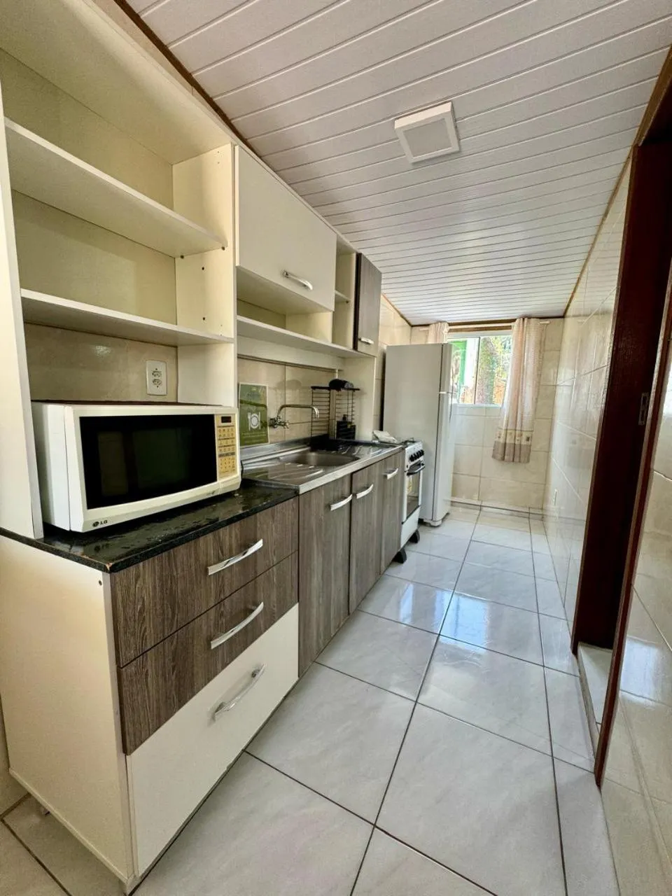 Kitchen or kitchenette in Pousada Lagoa Encantada