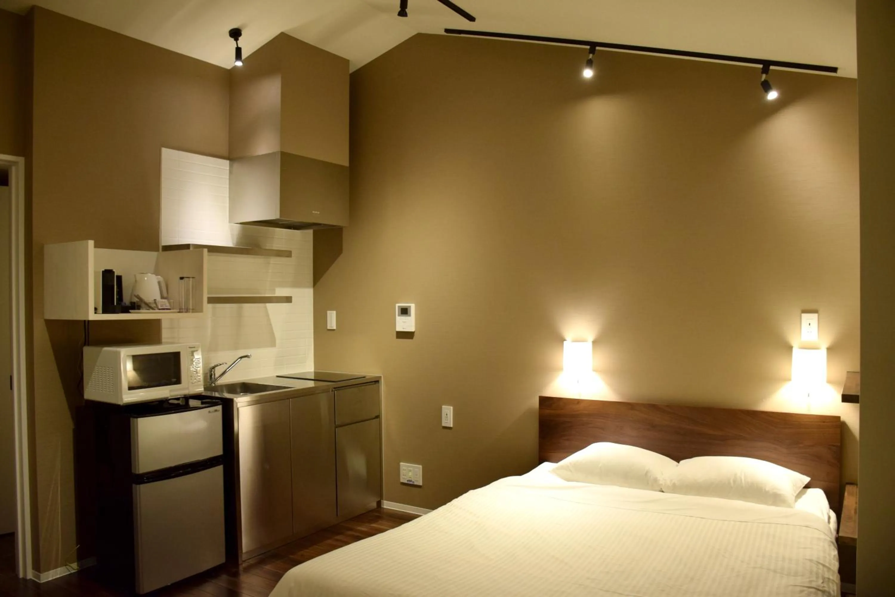 Photo of the whole room, Bed in Condominium MIRAHAKONE